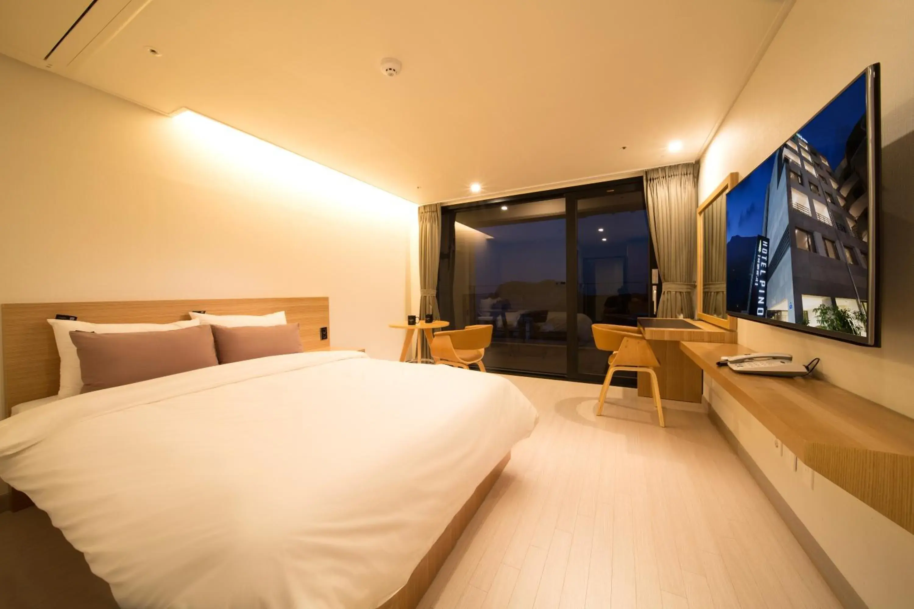 Bed in Pino Hotel Bed in Pino Hotel