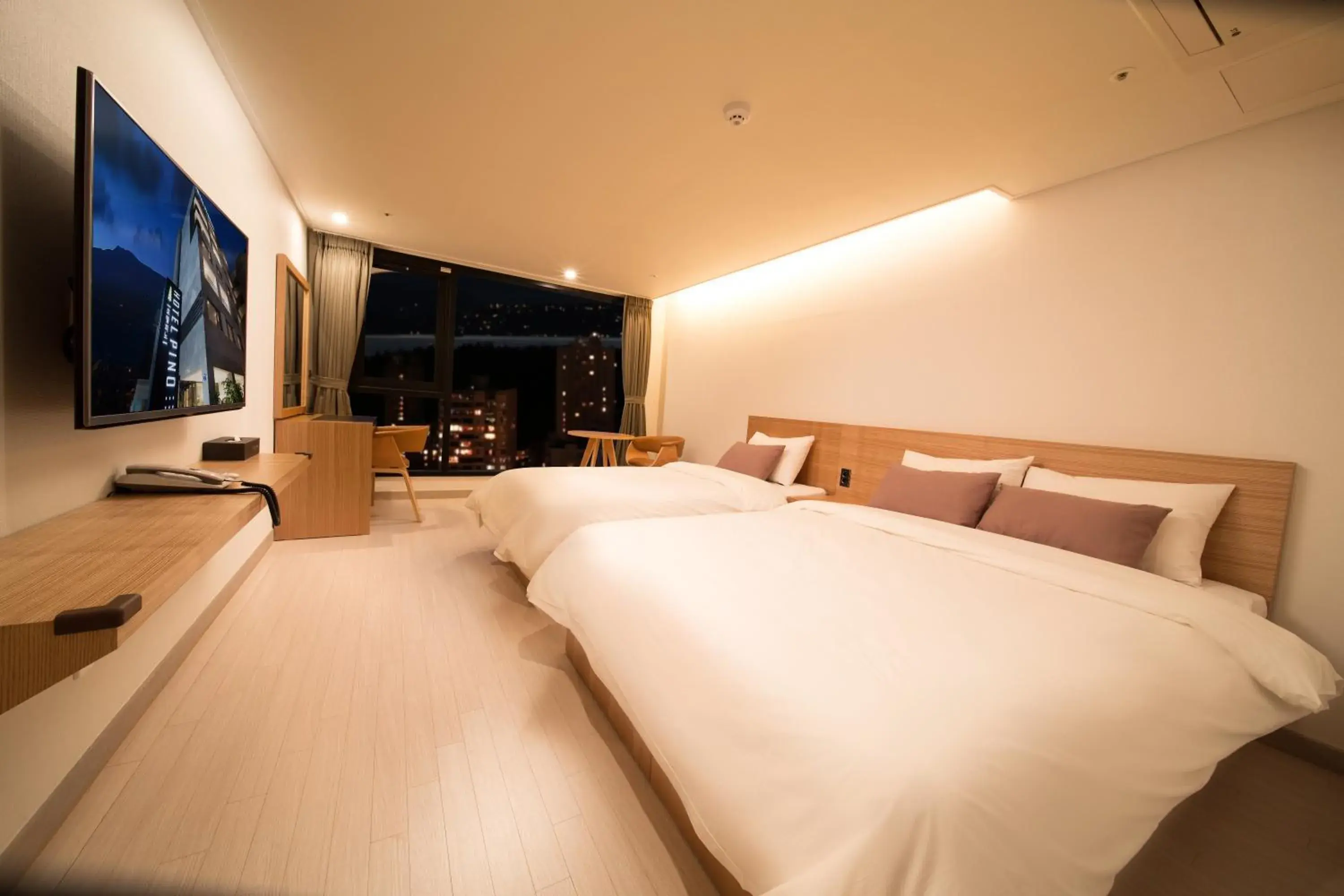 Bed in Pino Hotel Bed in Pino Hotel