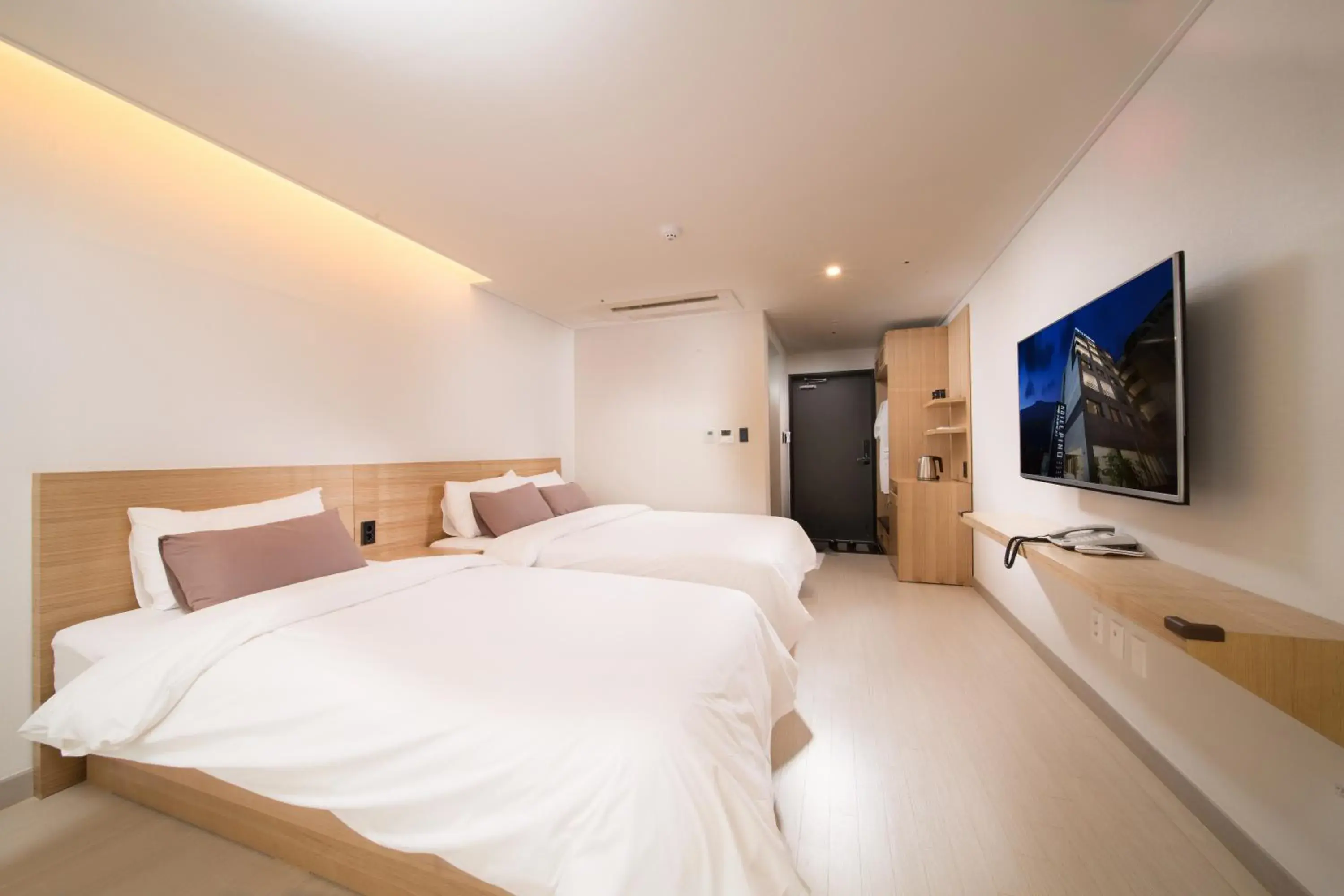 Bed in Pino Hotel Bed in Pino Hotel