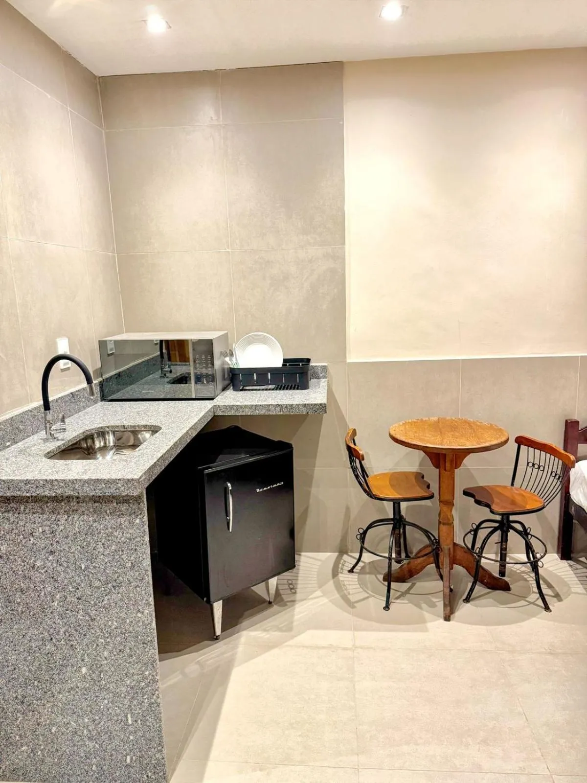 Kitchen or kitchenette in HMG Rio Suítes