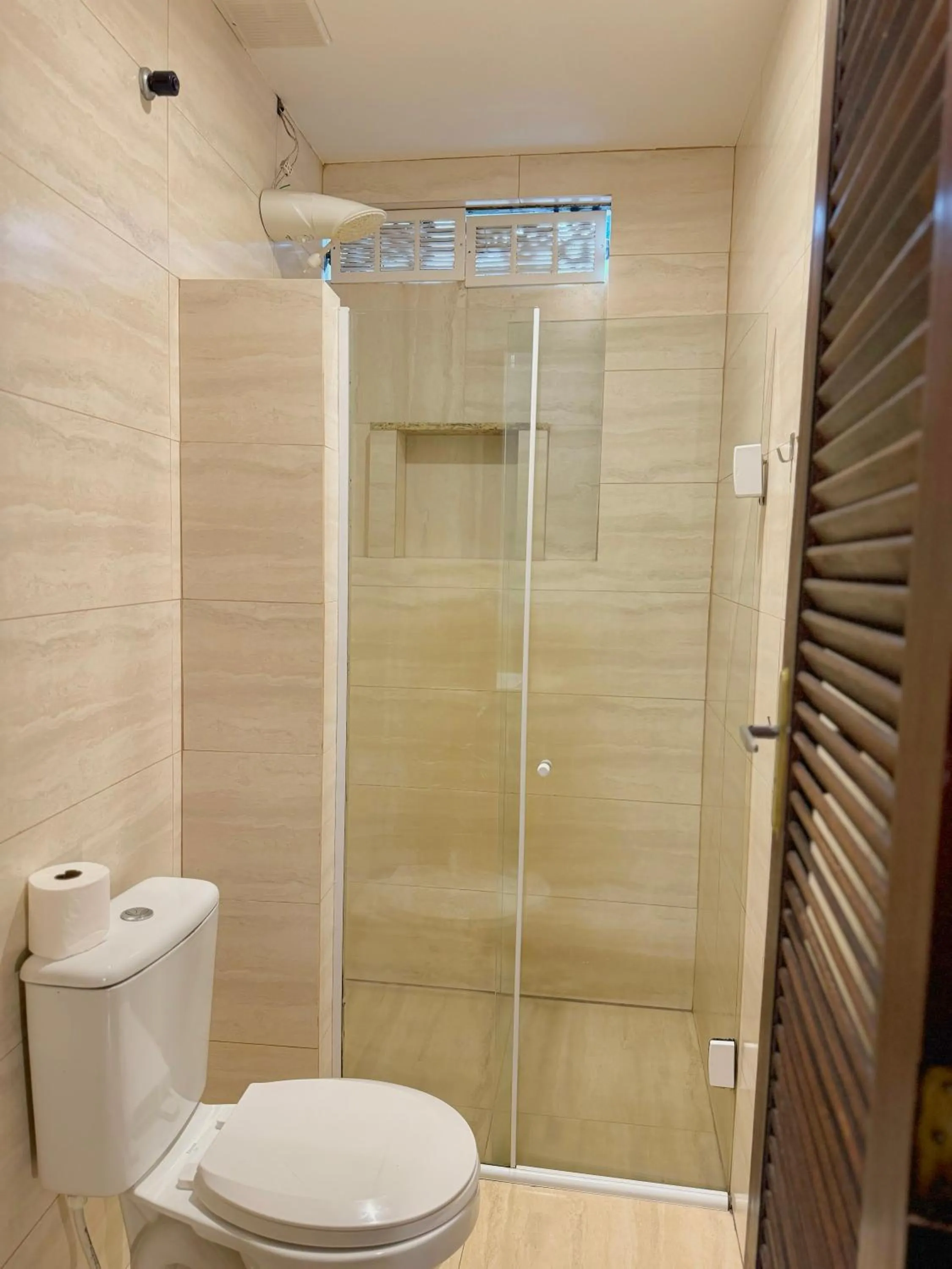 Shower in HMG Rio Suítes