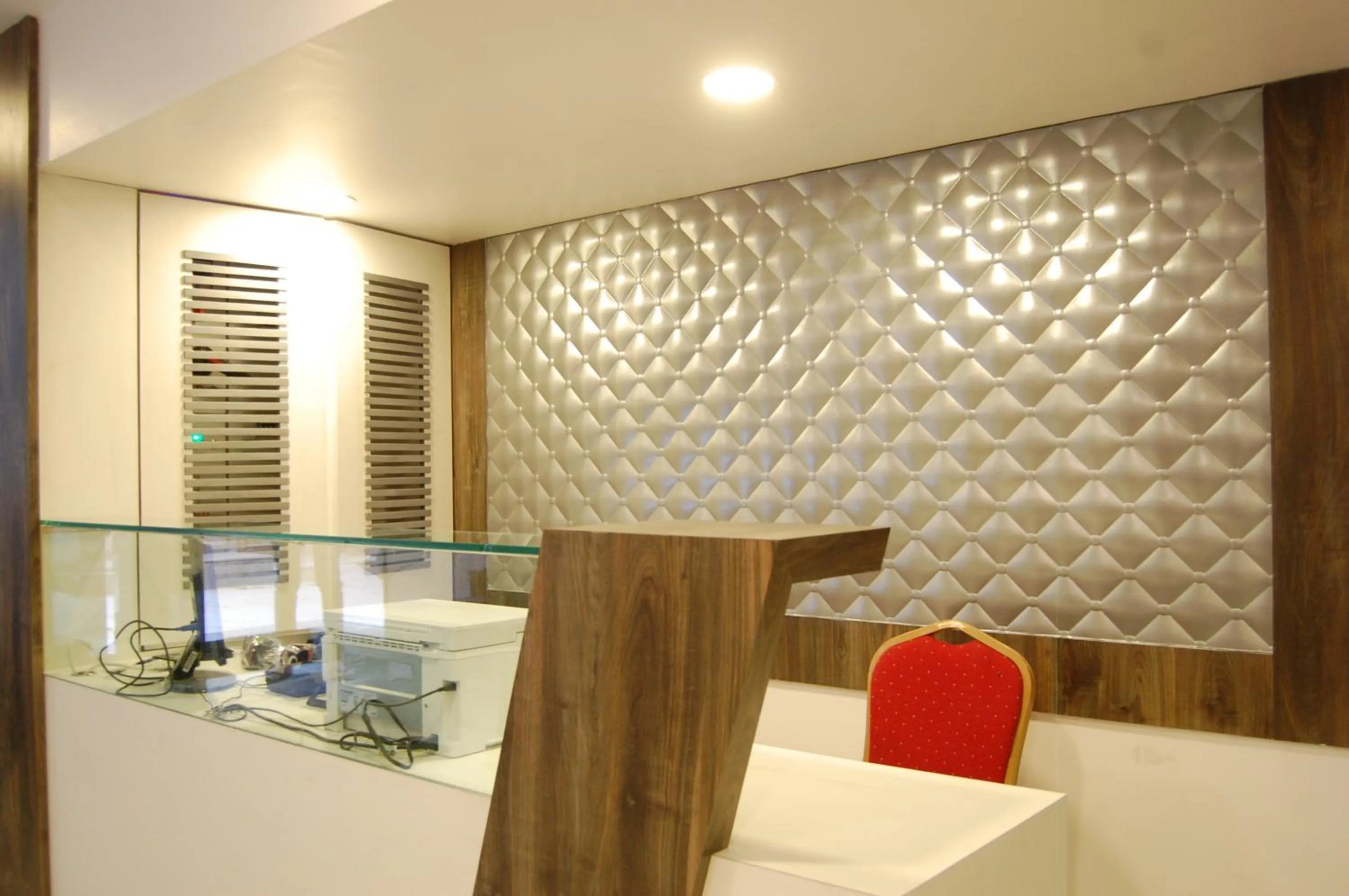 Lobby or reception in Hotel Sanmukh By Adamo