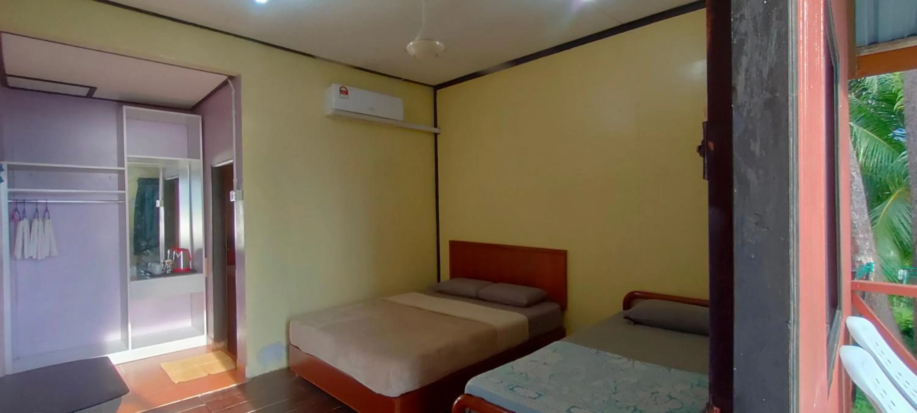 Bed in Restu Chalet Tioman