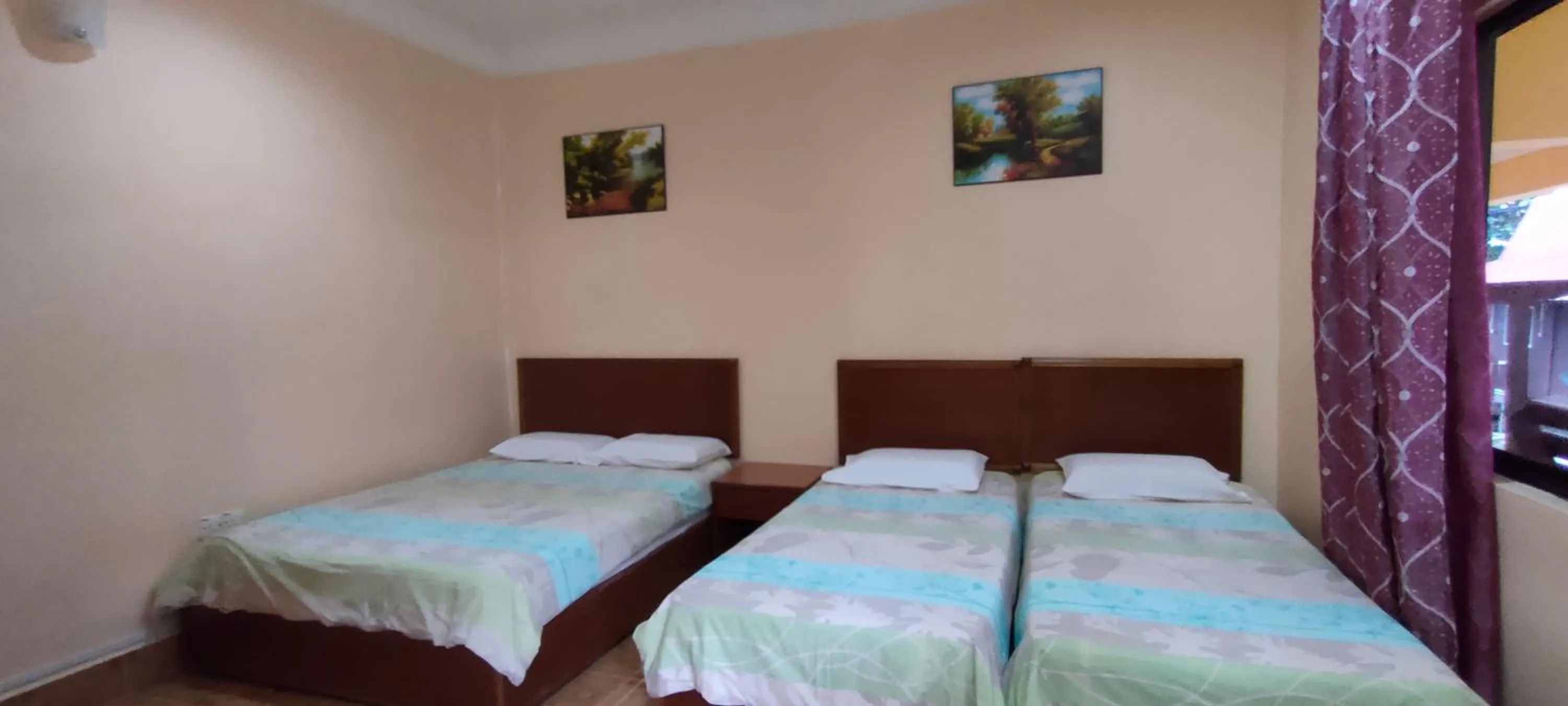 Bed in Restu Chalet Tioman