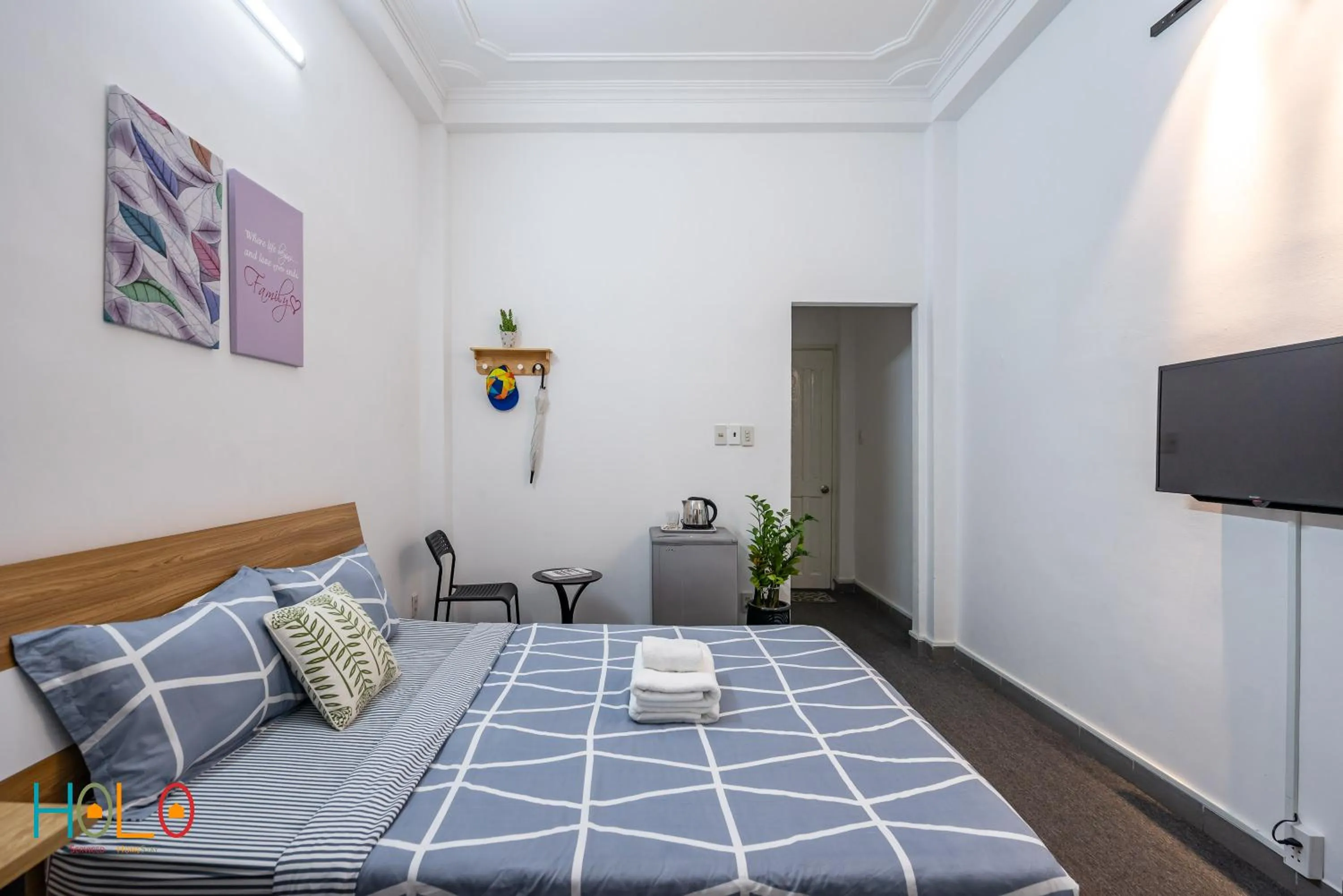 TV and multimedia, Bed in HoLo Fairy House Saigon - Serviced Homestay