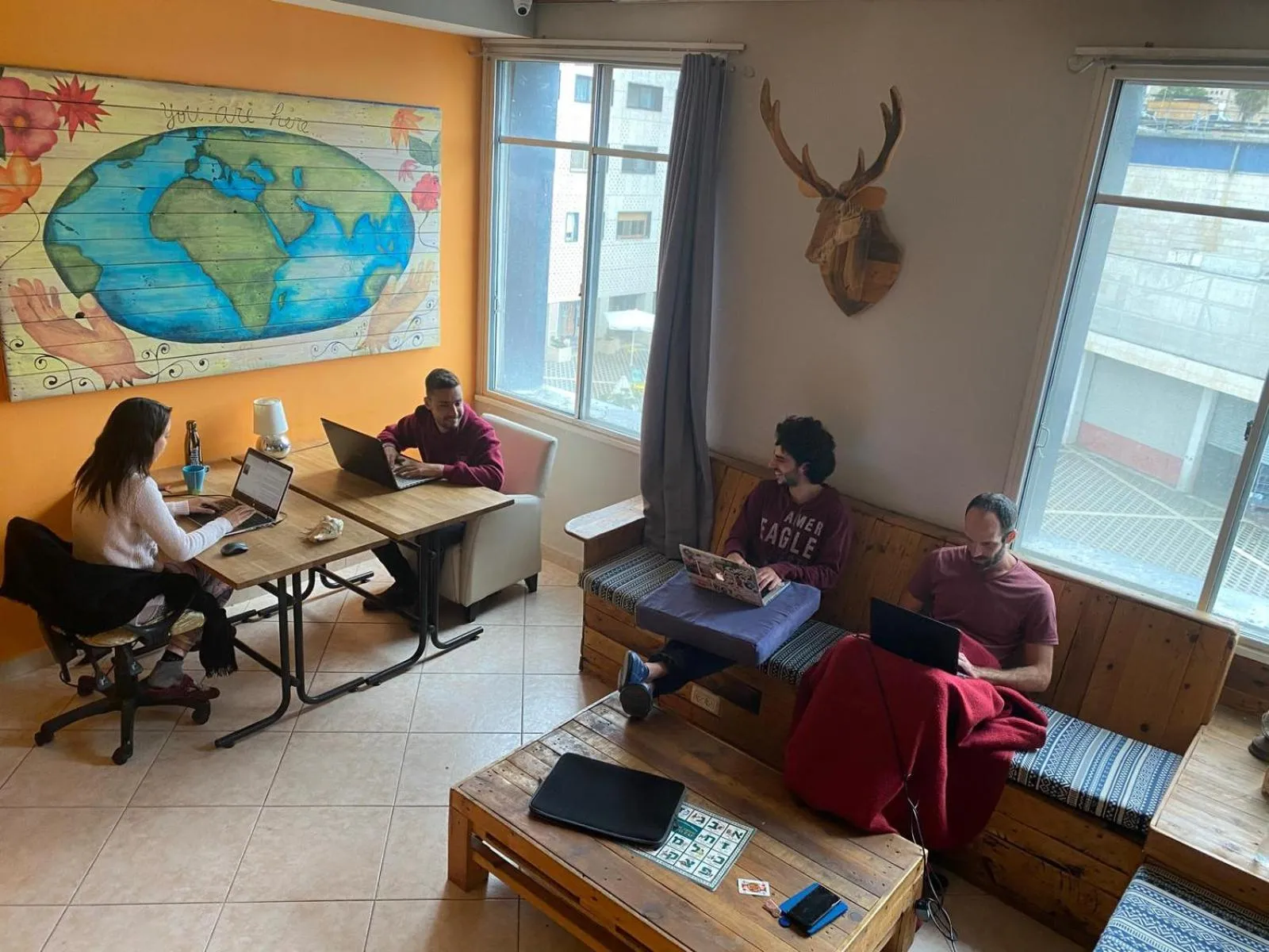 Communal lounge/ TV room in Tiberias Hostel