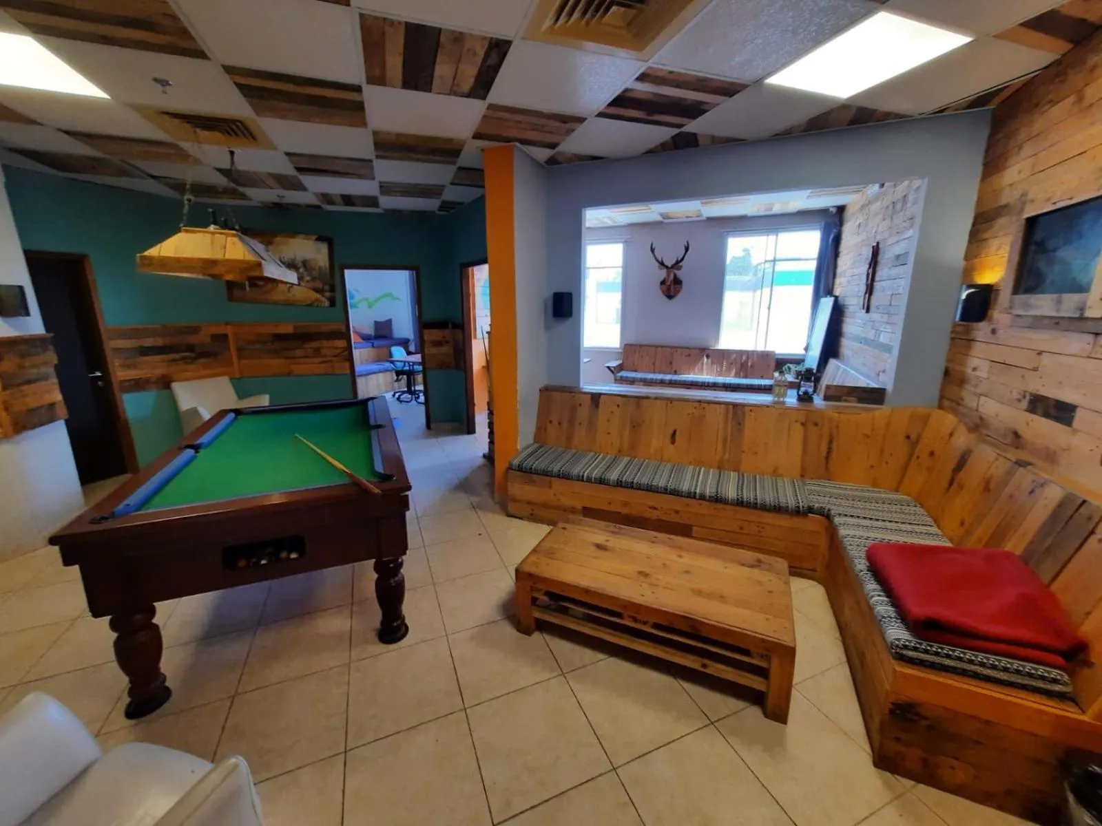 Communal lounge/ TV room in Tiberias Hostel