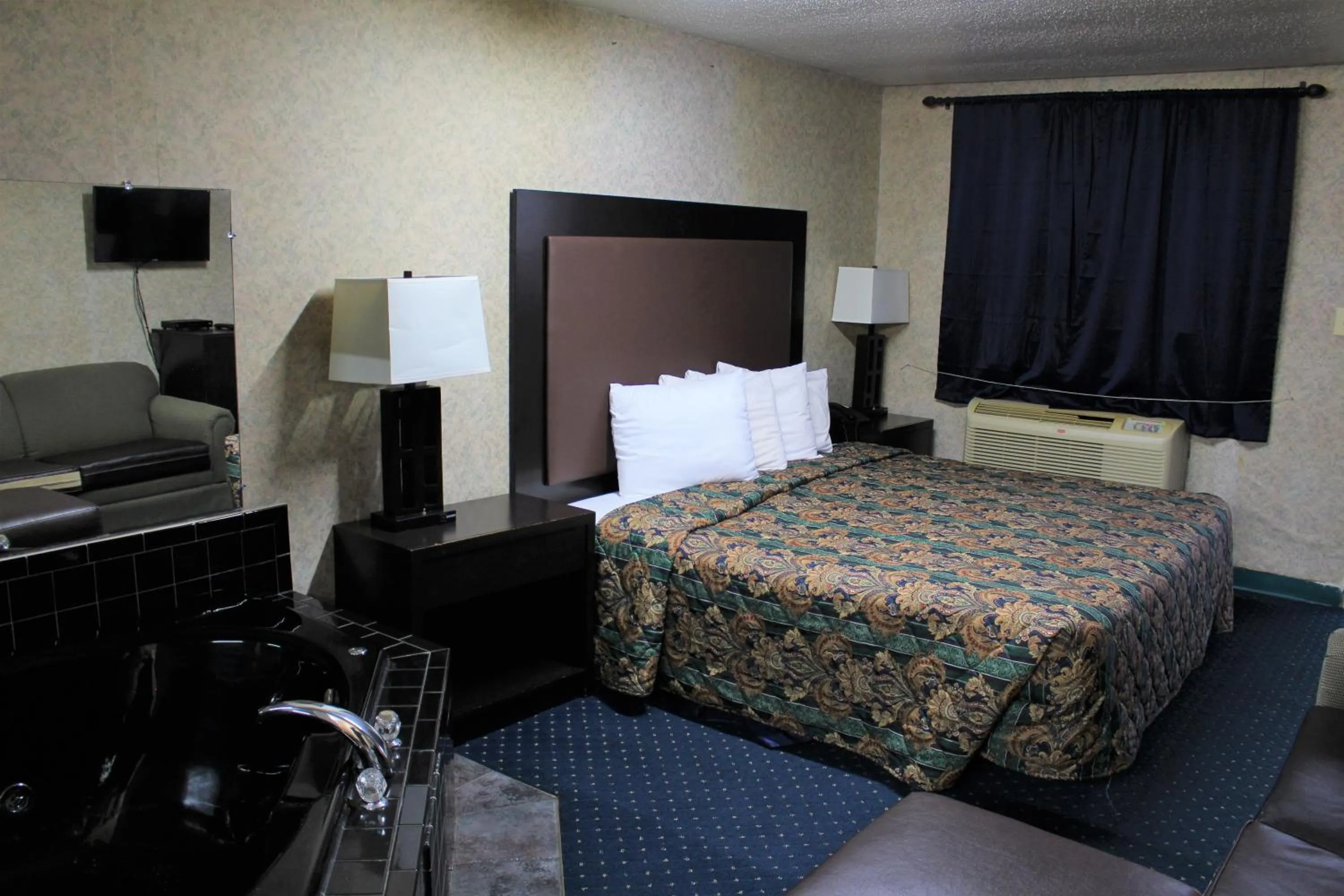 Bed in Budgetel Inn & Suites Atlantic City