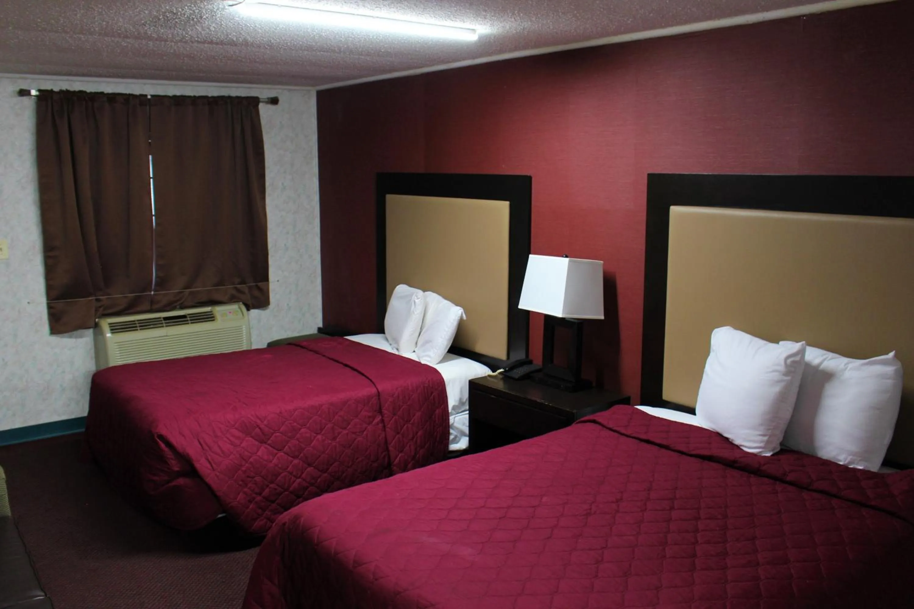 Bed in Budgetel Inn & Suites Atlantic City