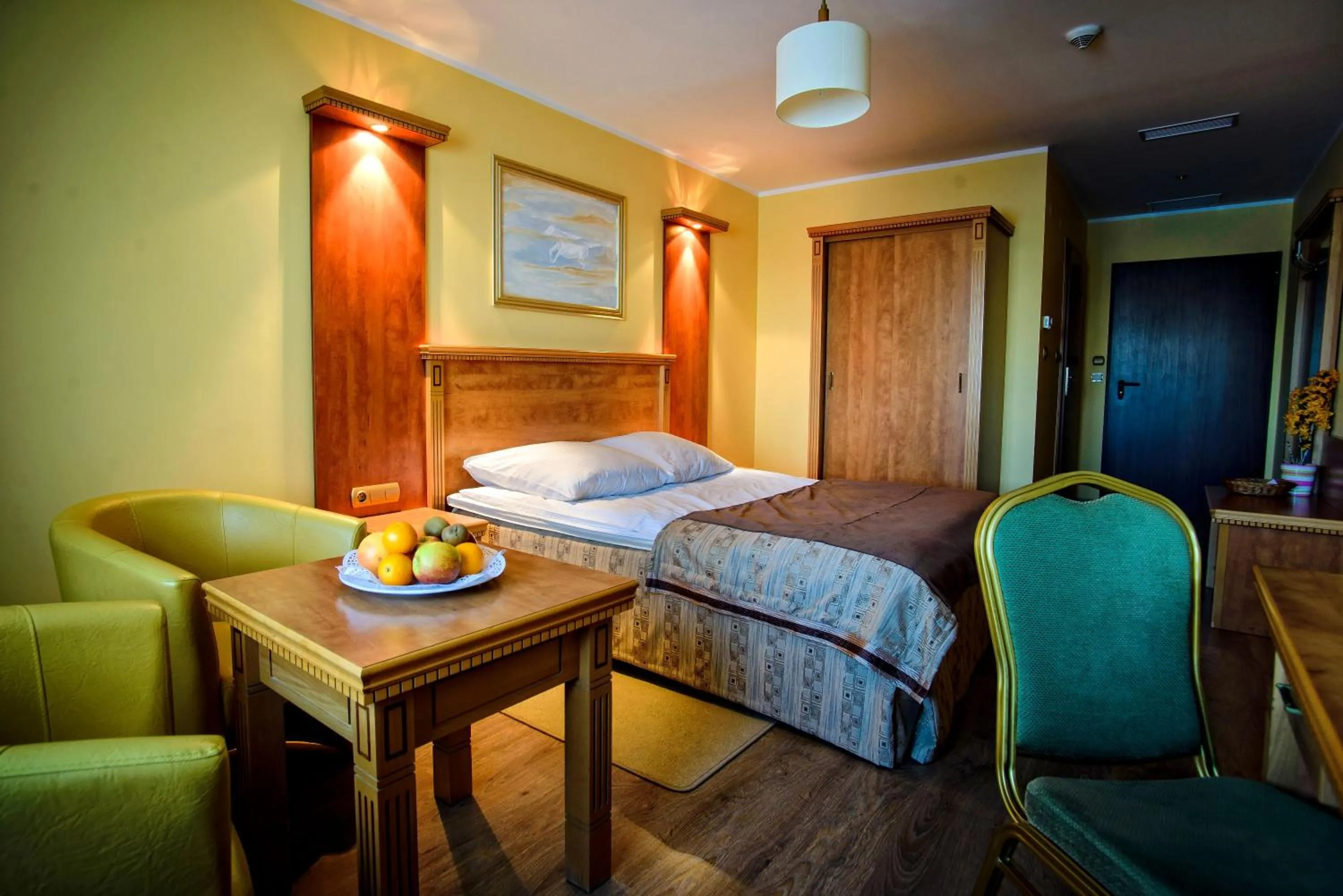 Seating area, Bed in Hotel Pietrak