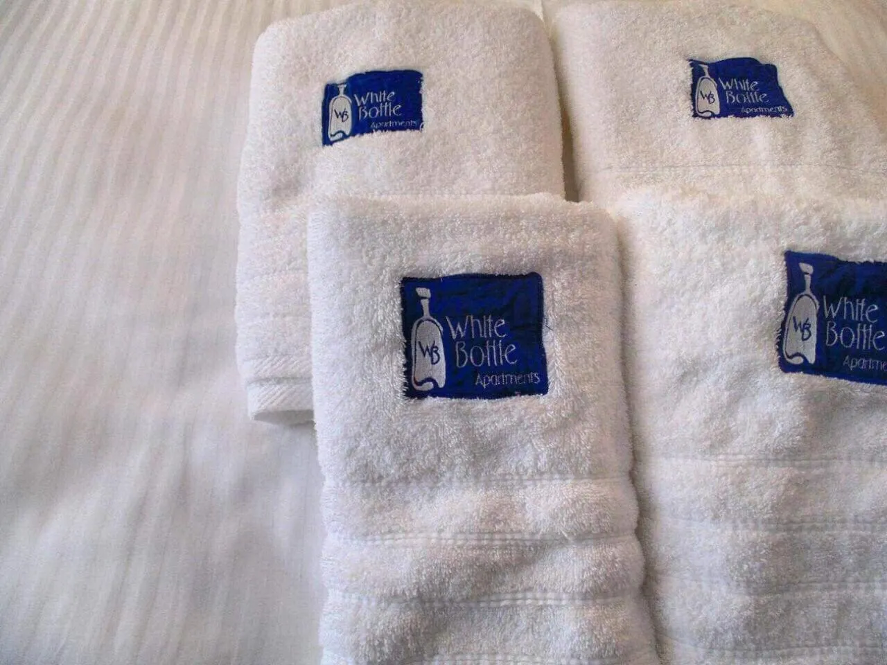 Bathroom, Bed in White Bottle Superior Apartments