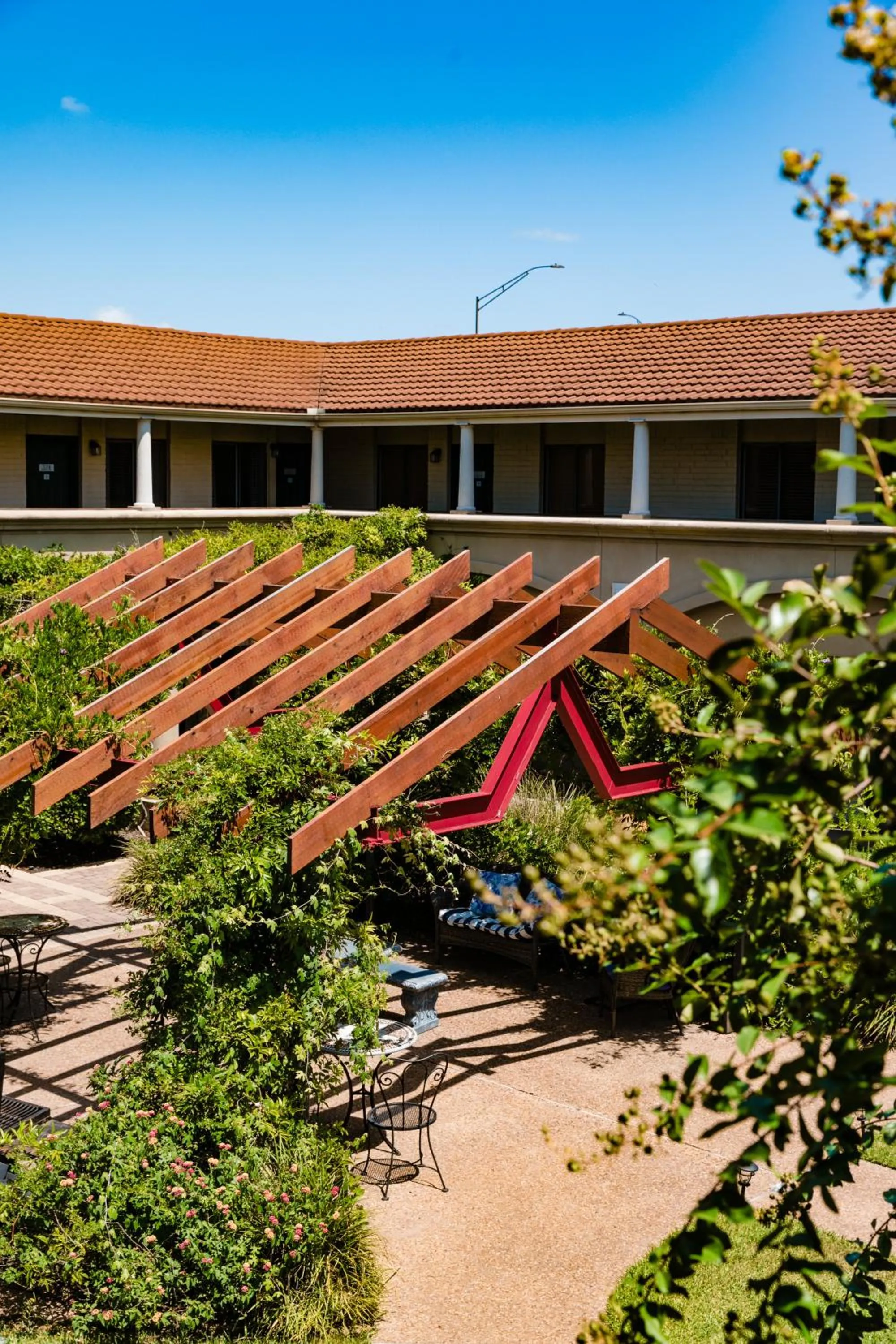 Property building in Vineyard Court Designer Suites Hotel