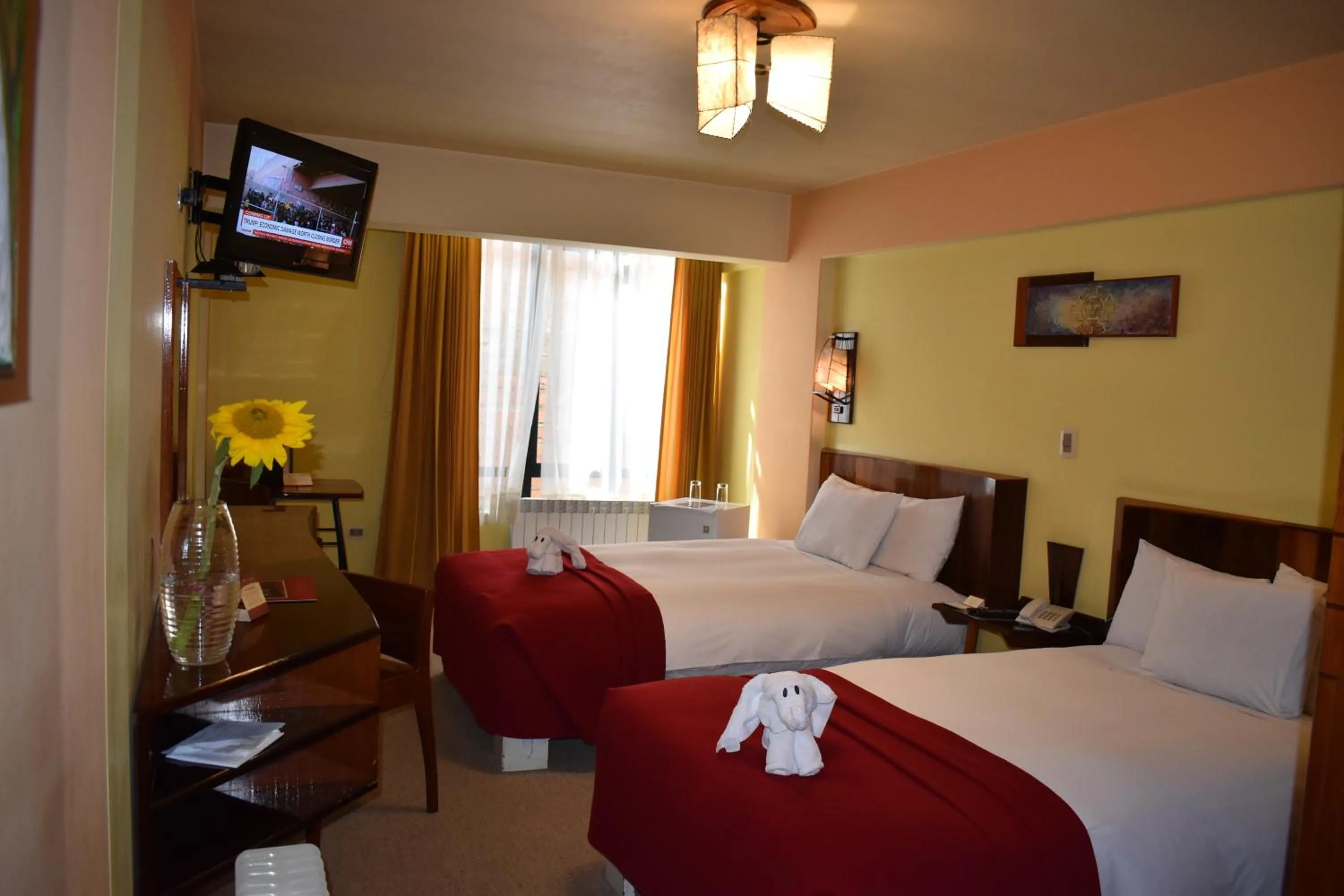 Bed in Royal Inn Hotel Puno