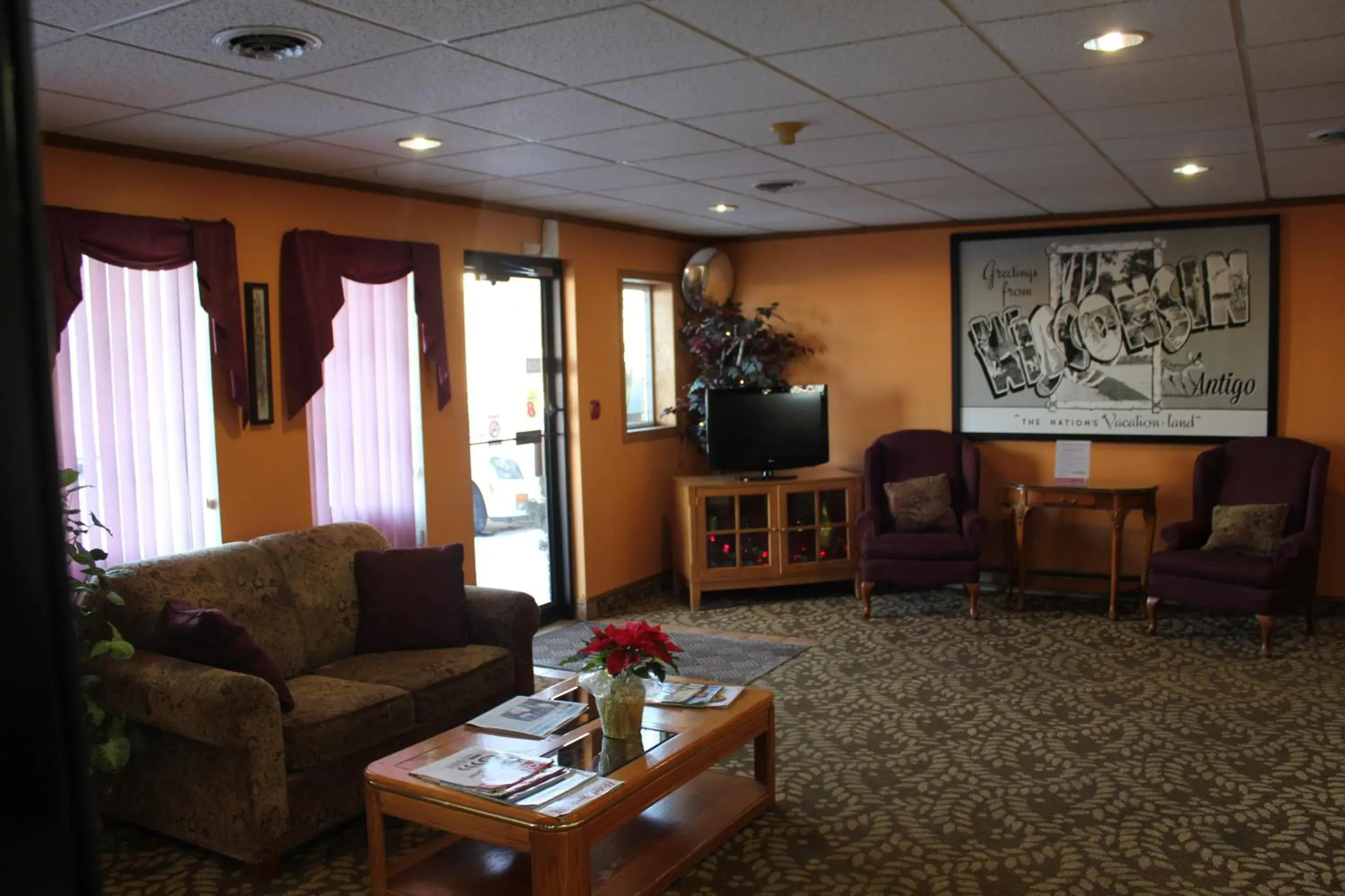 Lobby or reception in Super 8 by Wyndham Antigo Lobby or reception in Super 8 by Wyndham Antigo