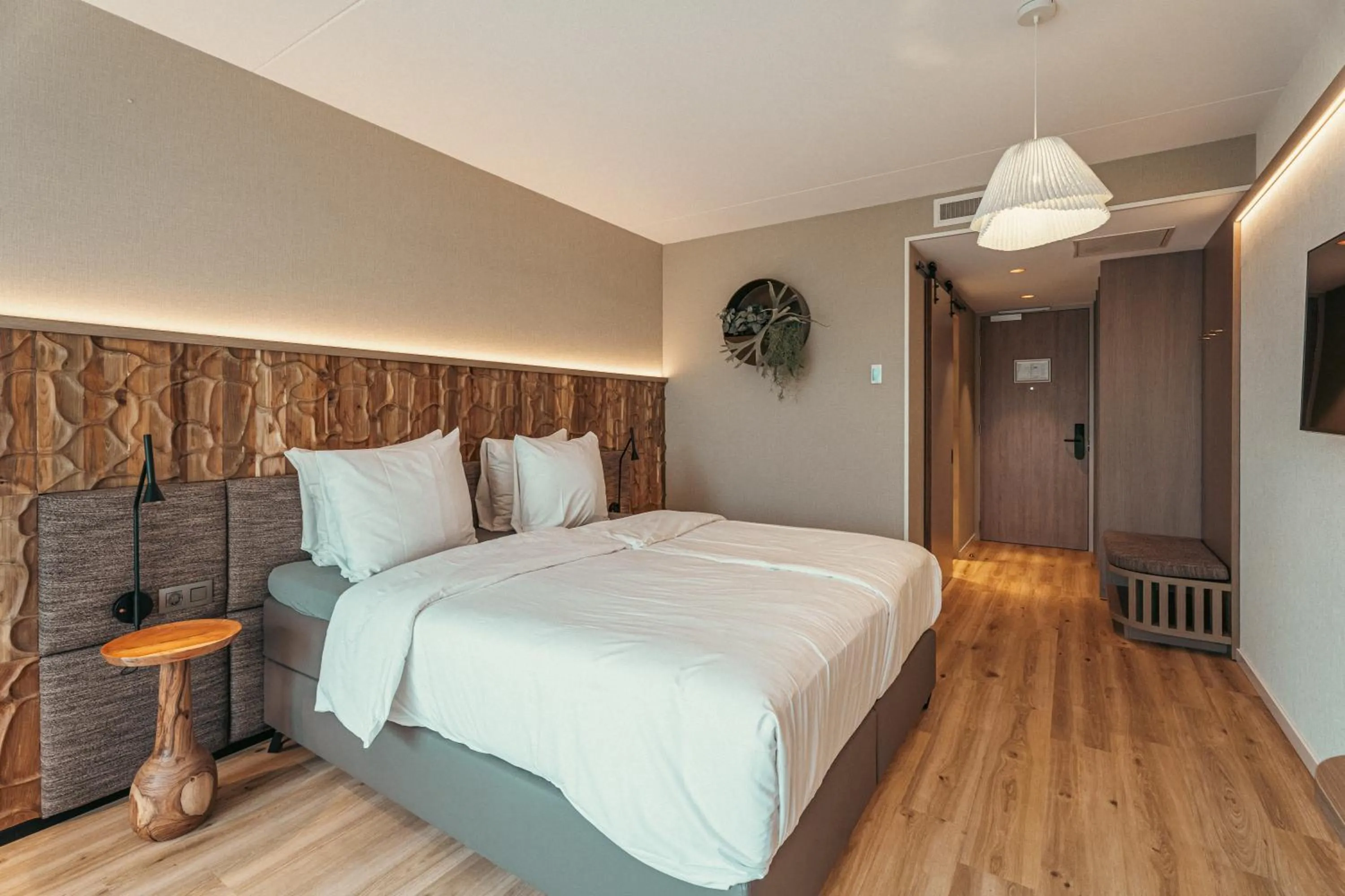 Bed in Strandhotel Duinoord