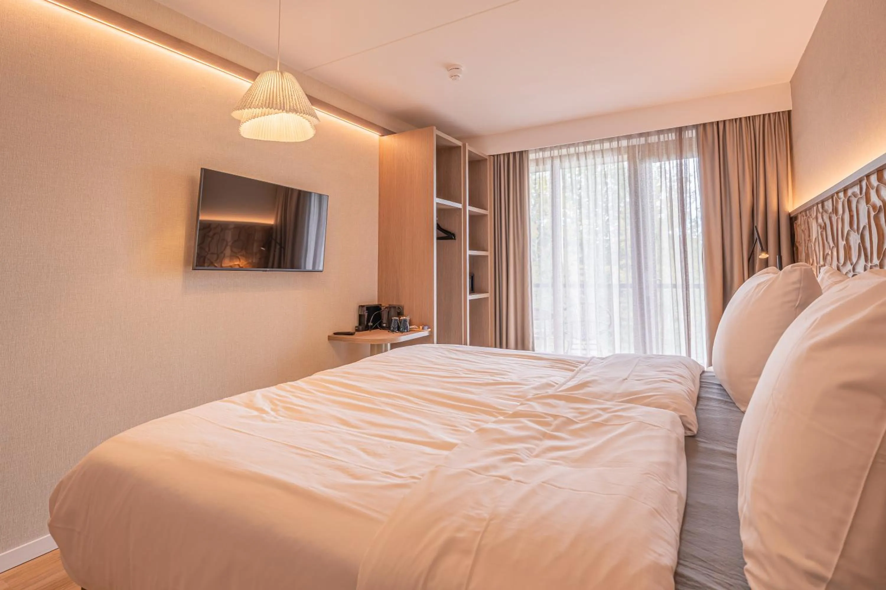 Bed in Strandhotel Duinoord