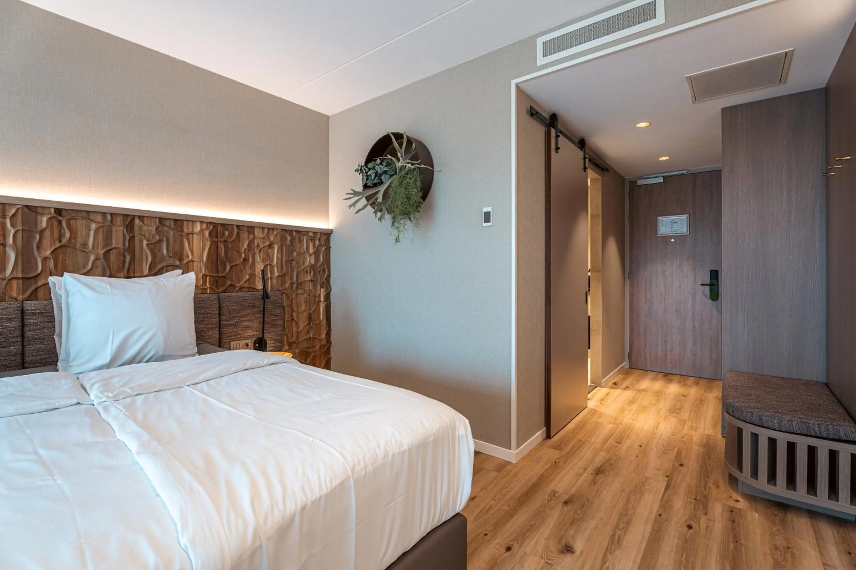 Bed in Strandhotel Duinoord