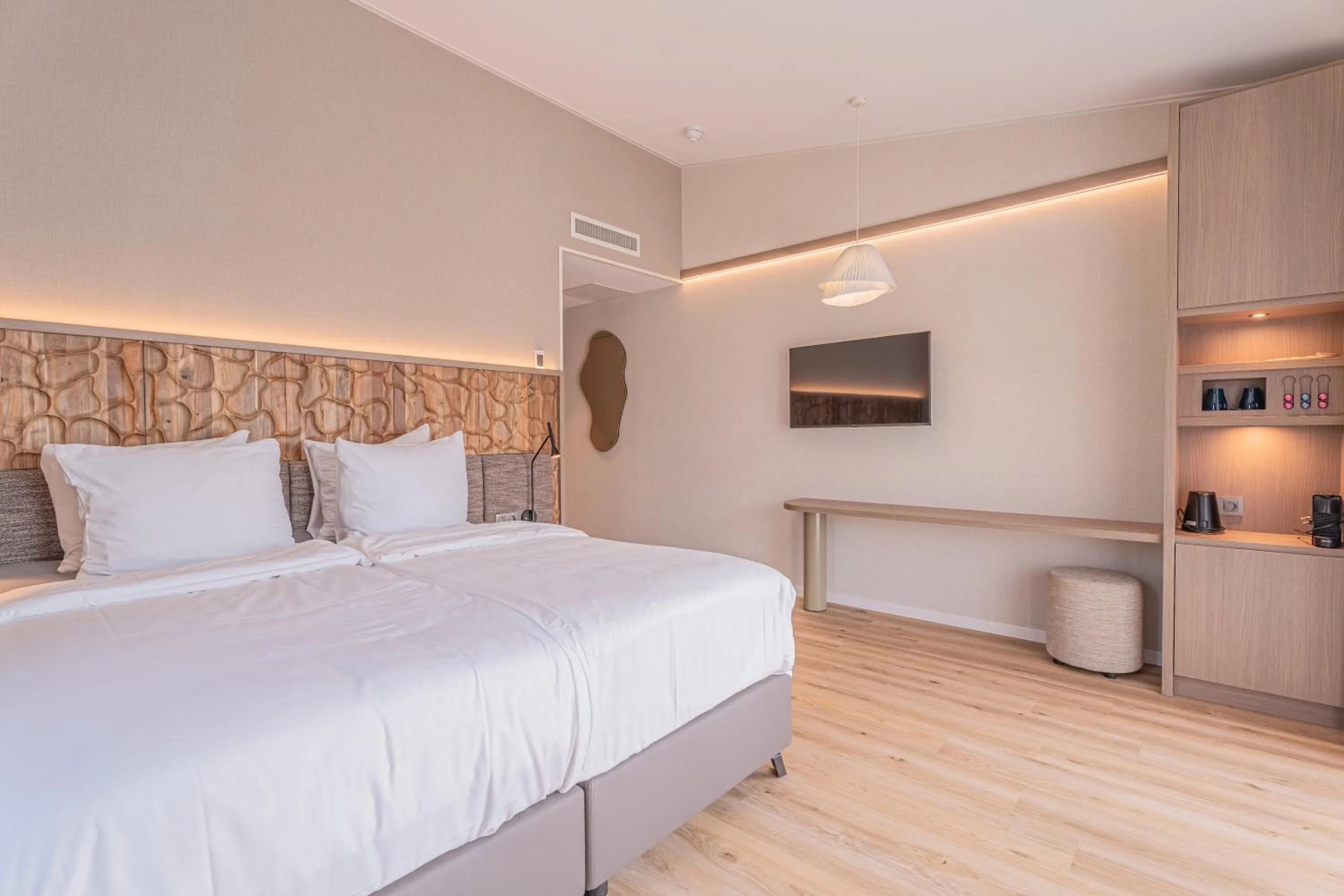 Bed in Strandhotel Duinoord