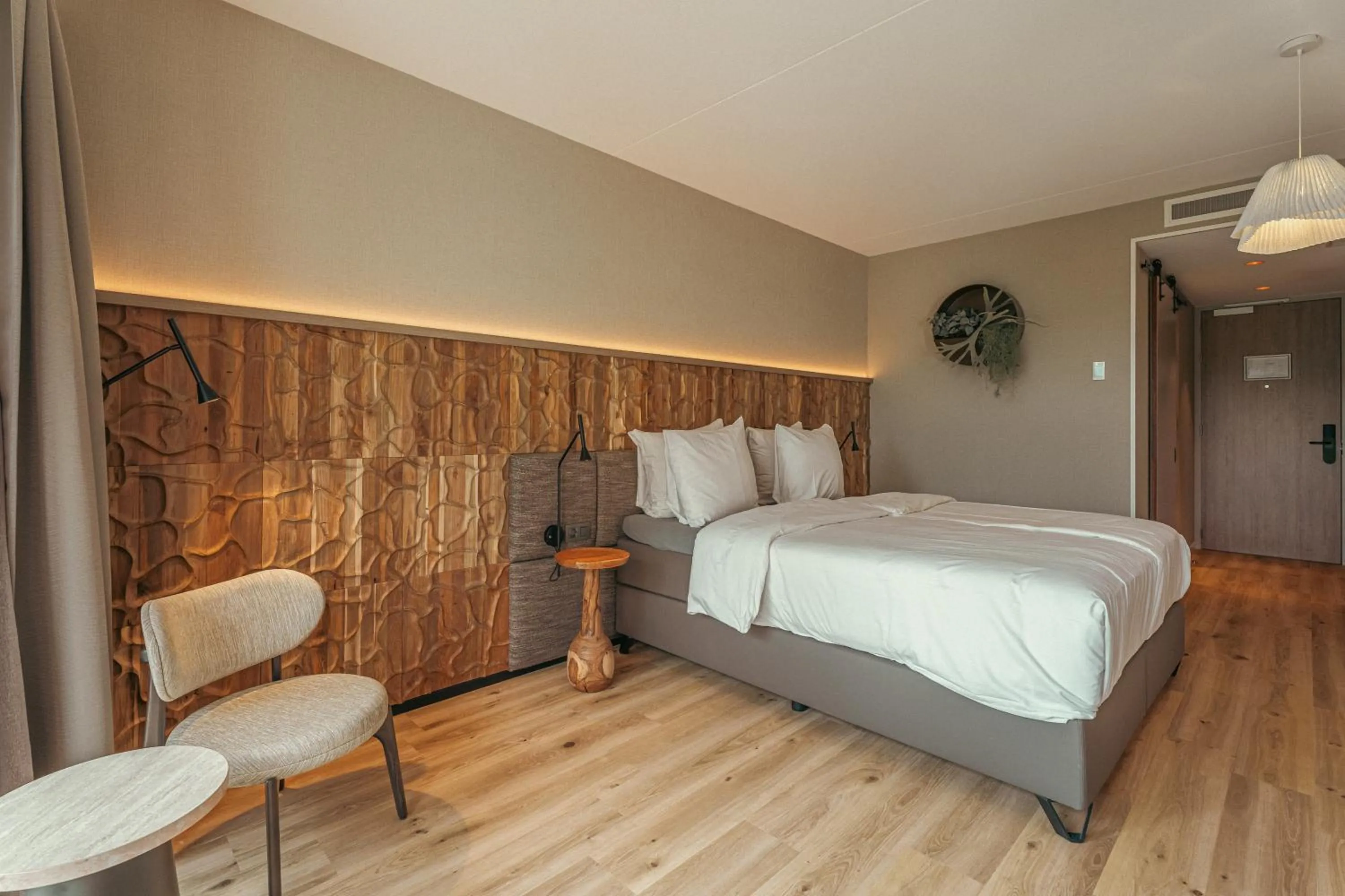 Bed in Strandhotel Duinoord