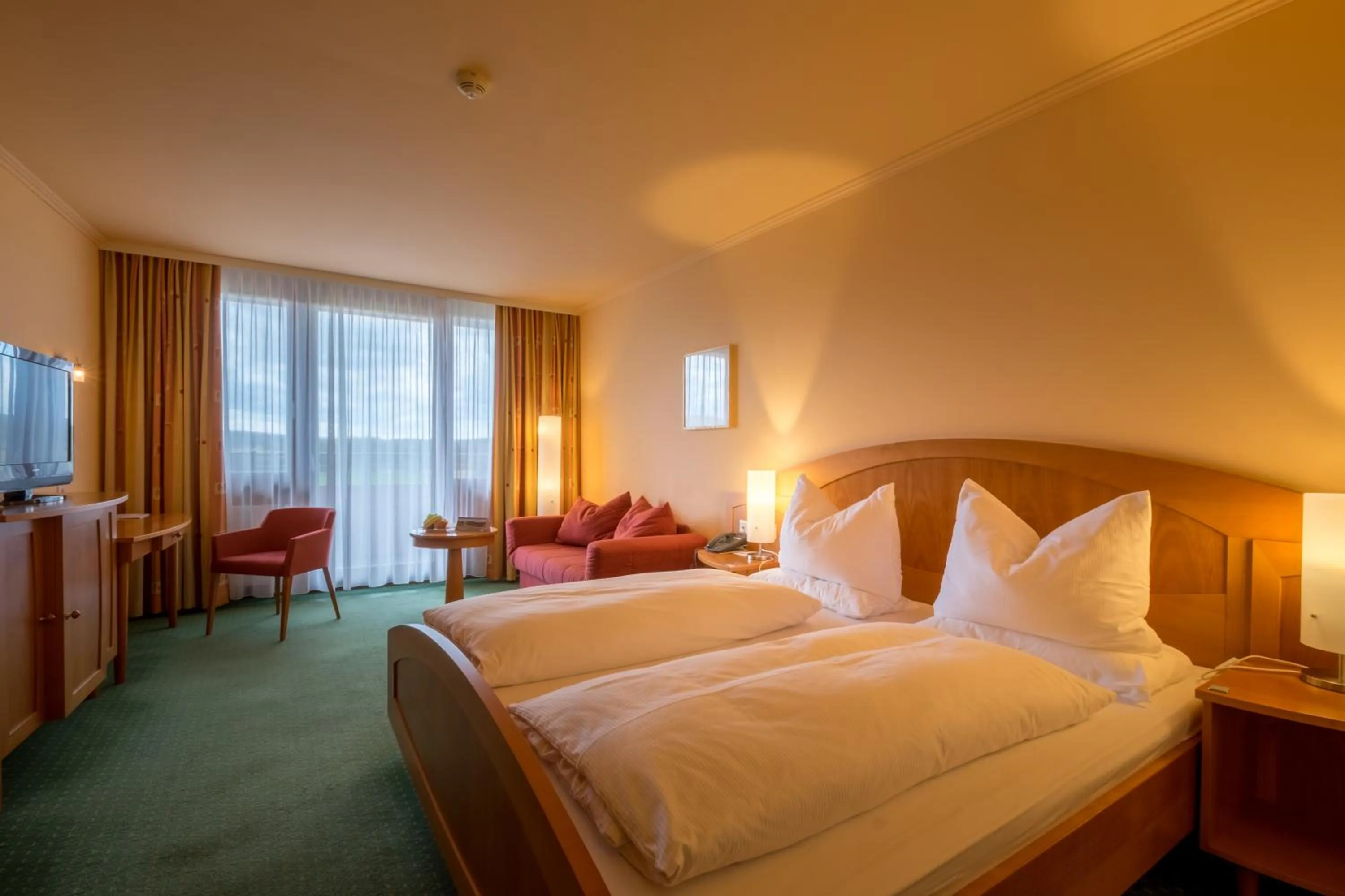 Photo of the whole room, Bed in Gesundheitshotel Weißenstadt am See