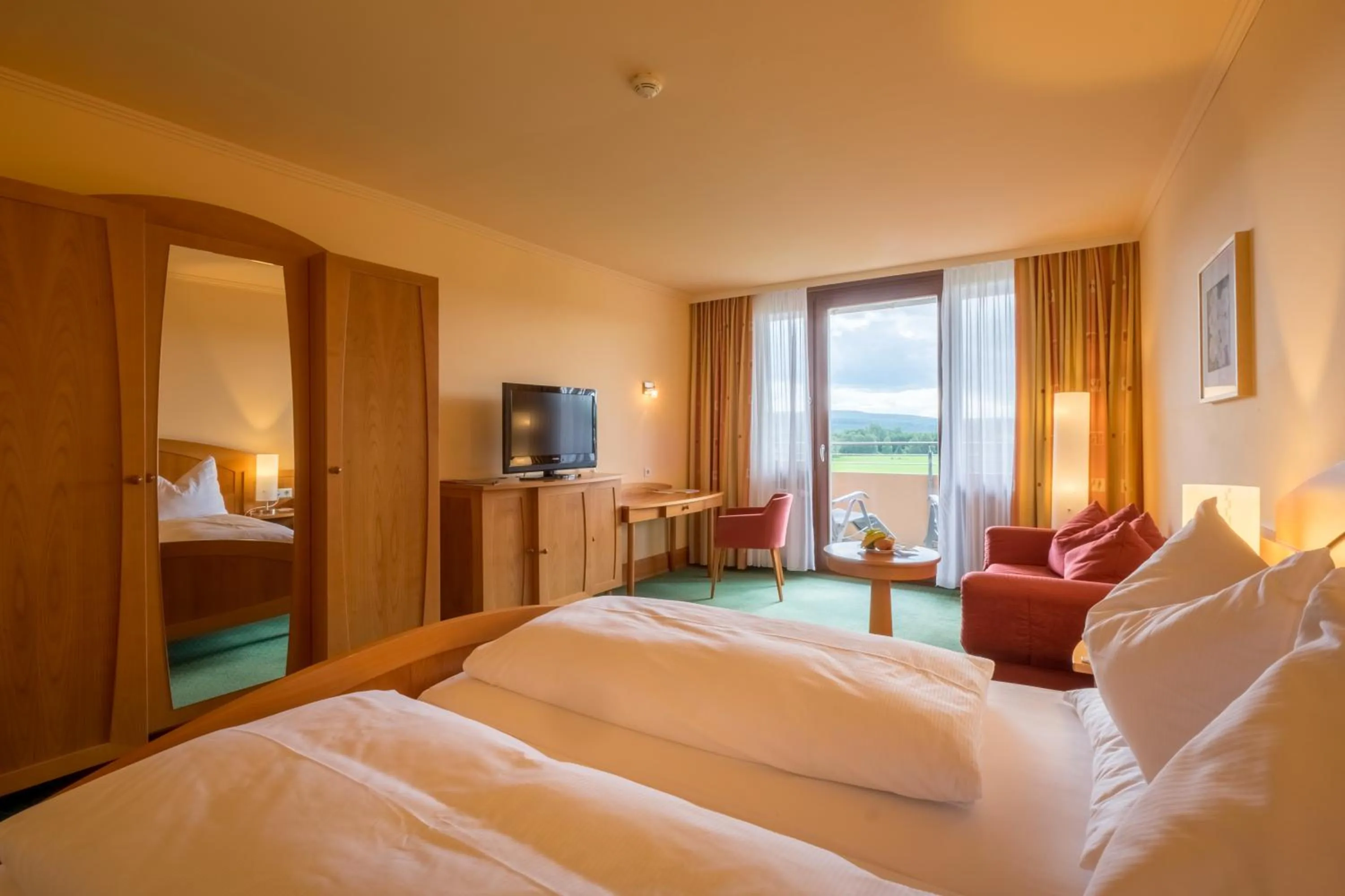 Photo of the whole room, Bed in Gesundheitshotel Weißenstadt am See