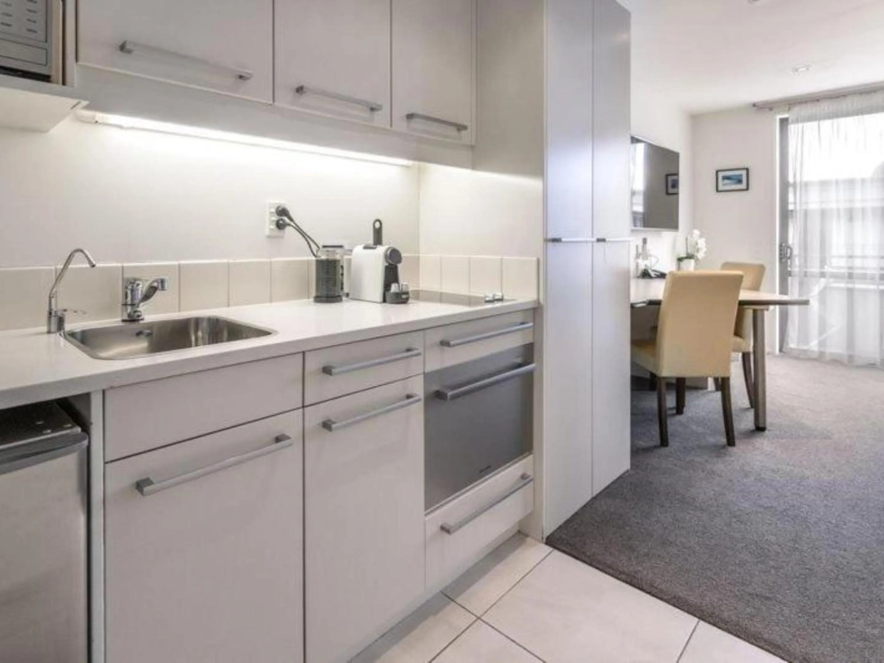 Kitchen or kitchenette in Palazzo Motor Lodge