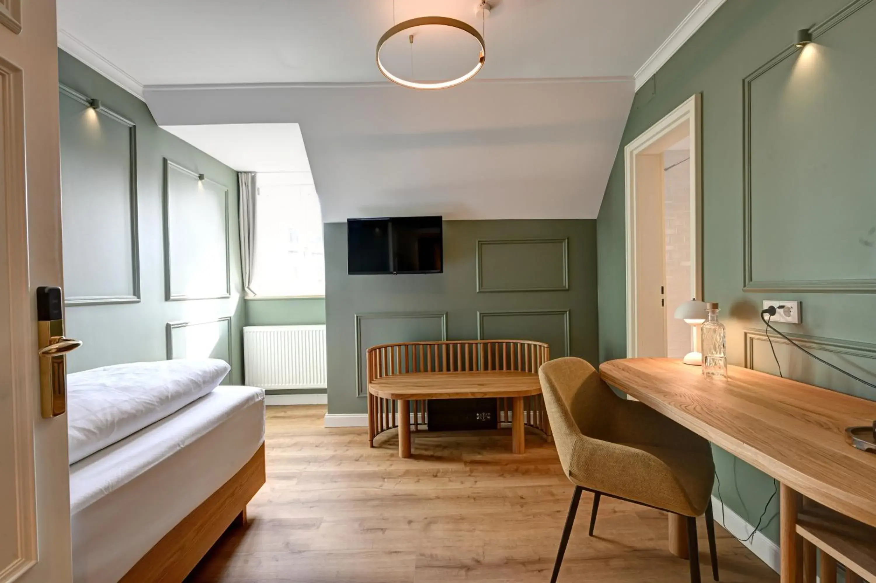 Bed in Hotel Uhland Bed in Hotel Uhland