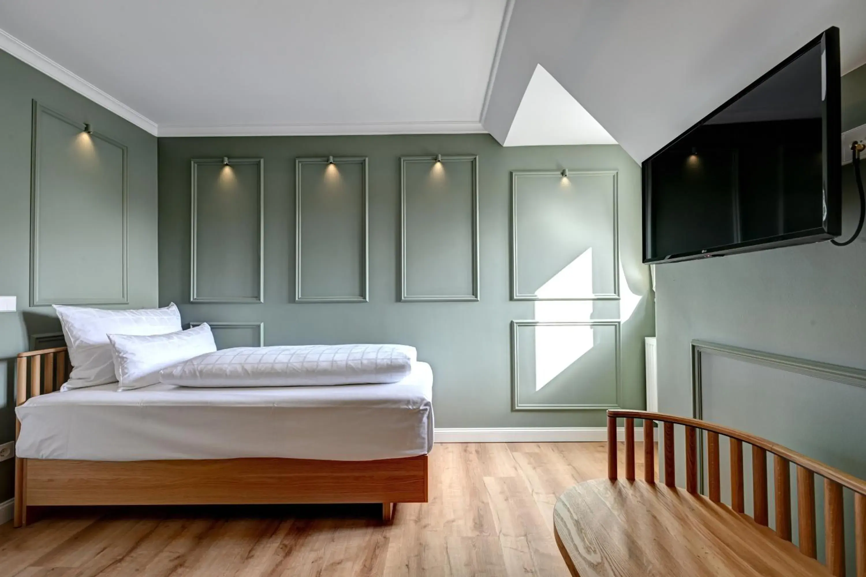 Bed in Hotel Uhland Bed in Hotel Uhland