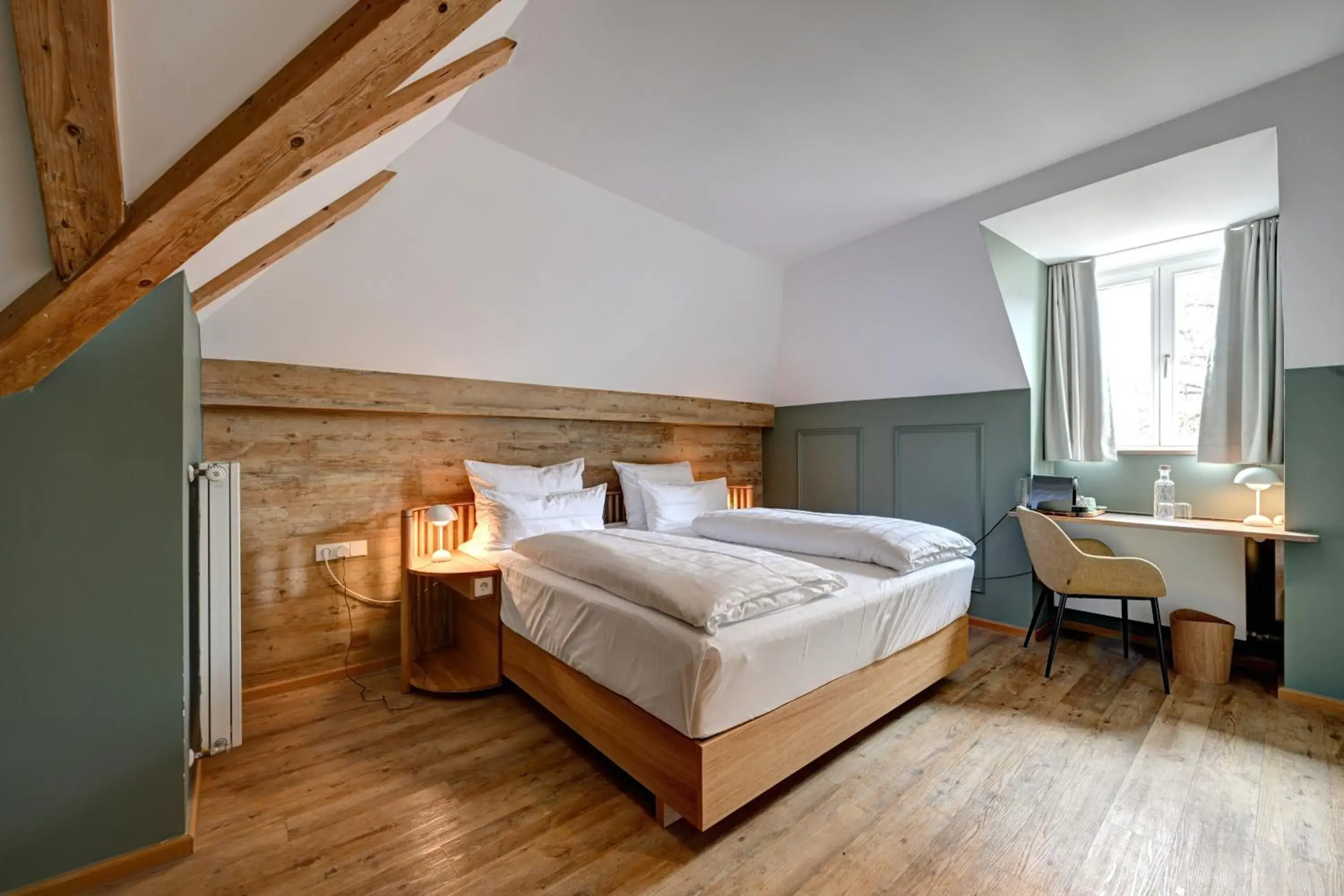 Bed in Hotel Uhland Bed in Hotel Uhland