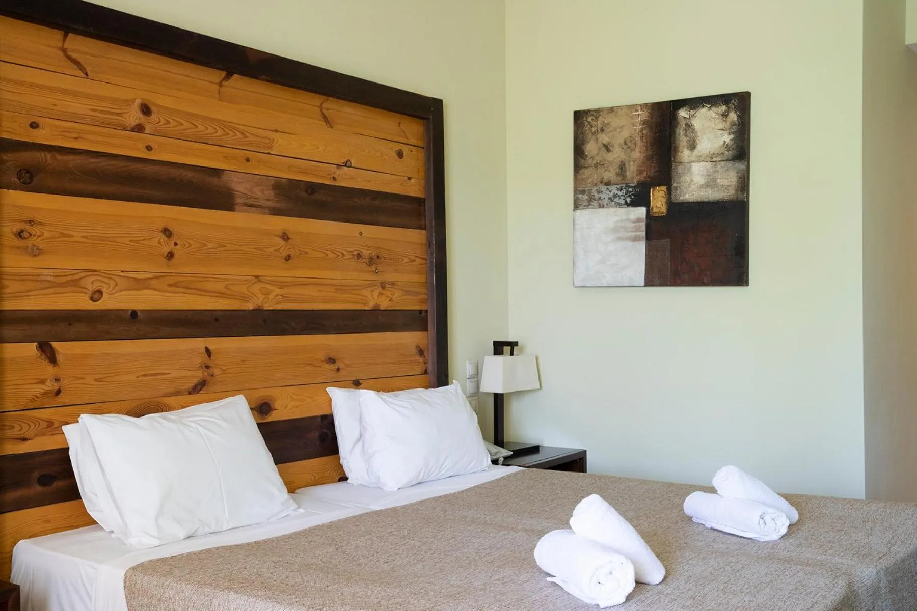 Bed in Olympian Bay Grand Resort