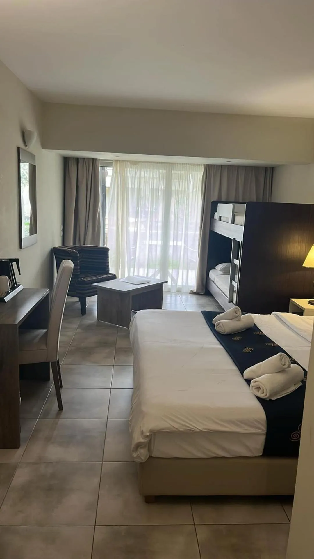 Bed in Olympian Bay Grand Resort