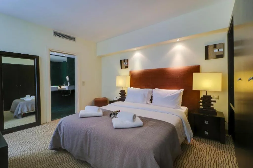 Bed in Olympian Bay Grand Resort