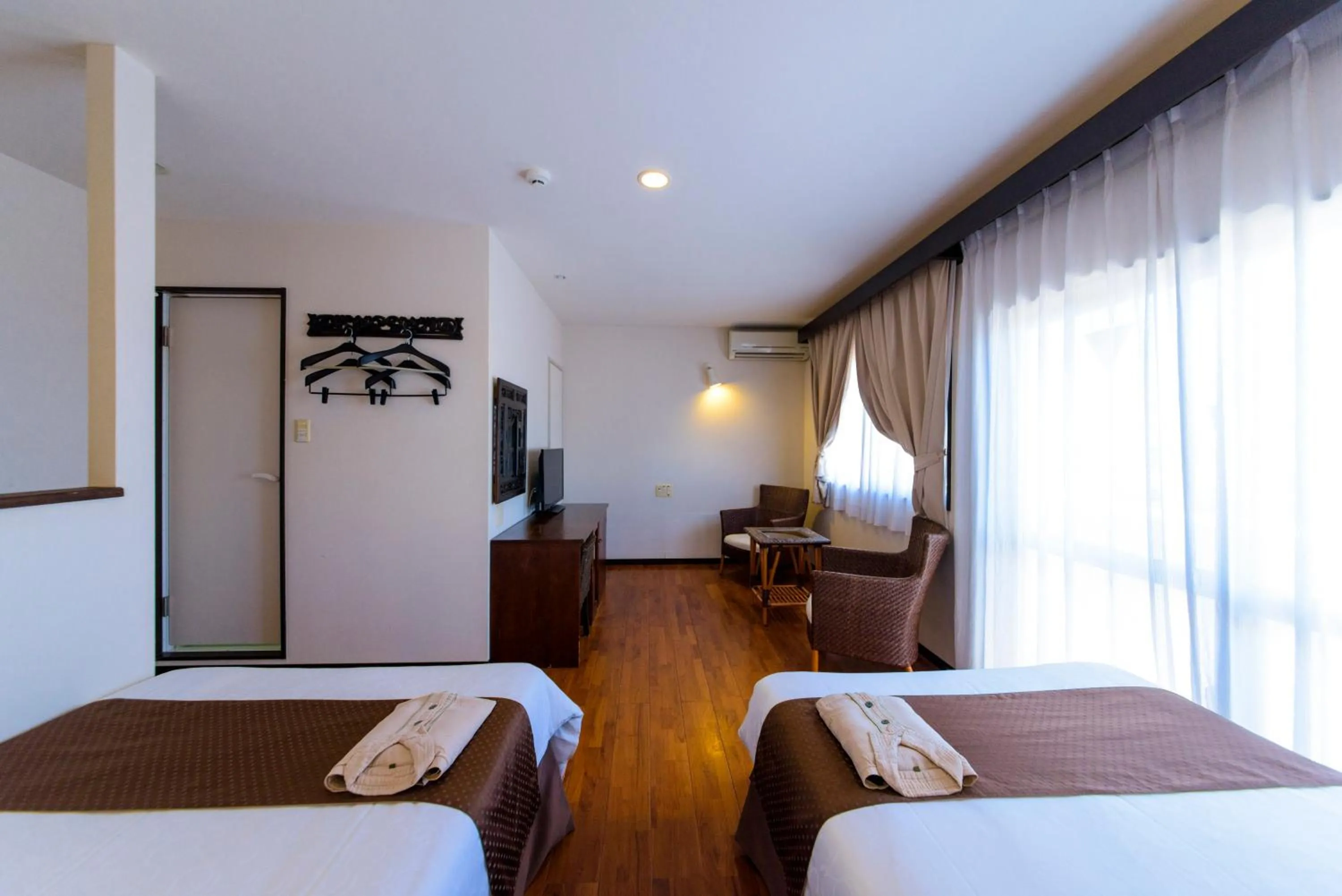 Photo of the whole room, Bed in Hotel Patina Ishigakijima