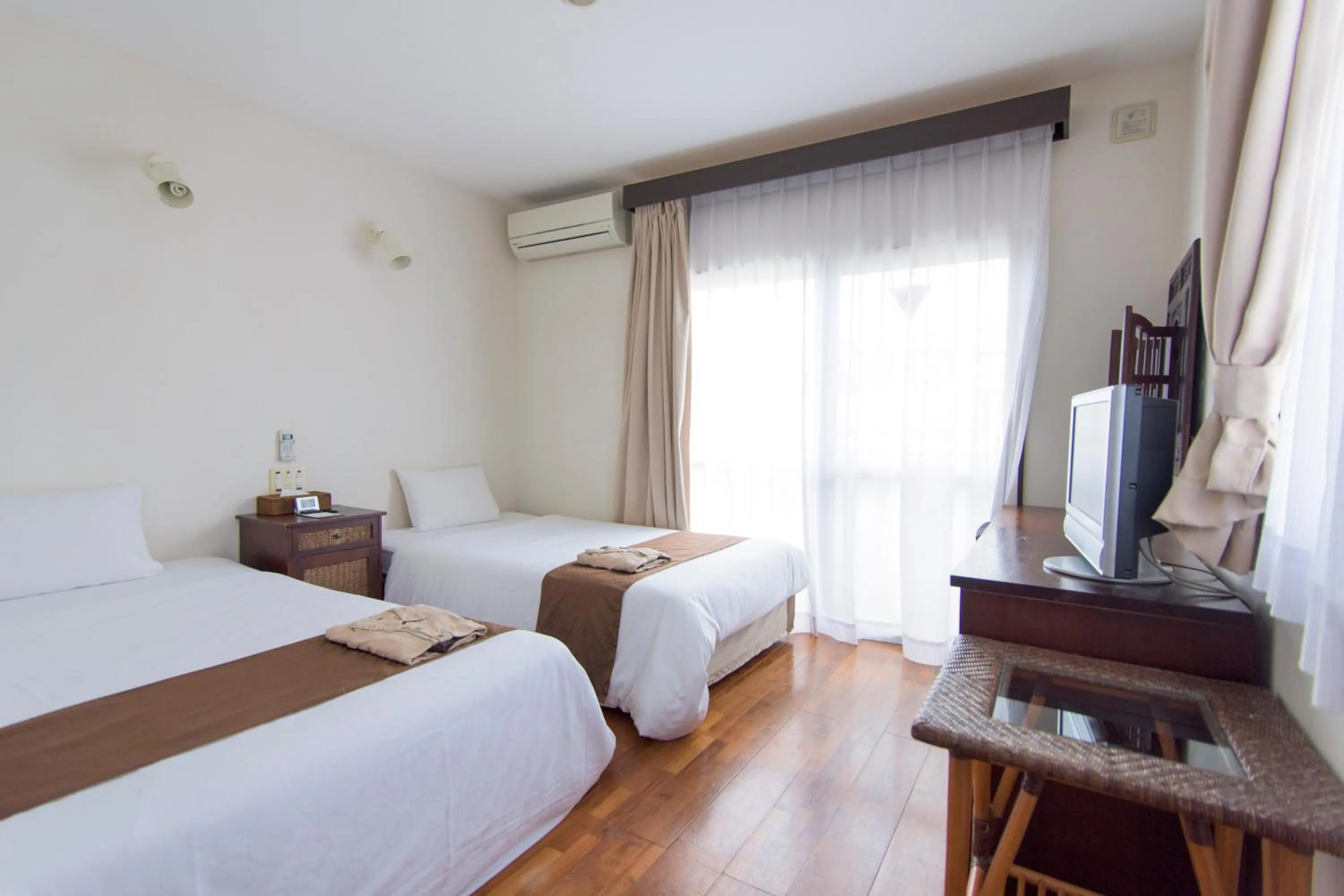 Photo of the whole room, Bed in Hotel Patina Ishigakijima