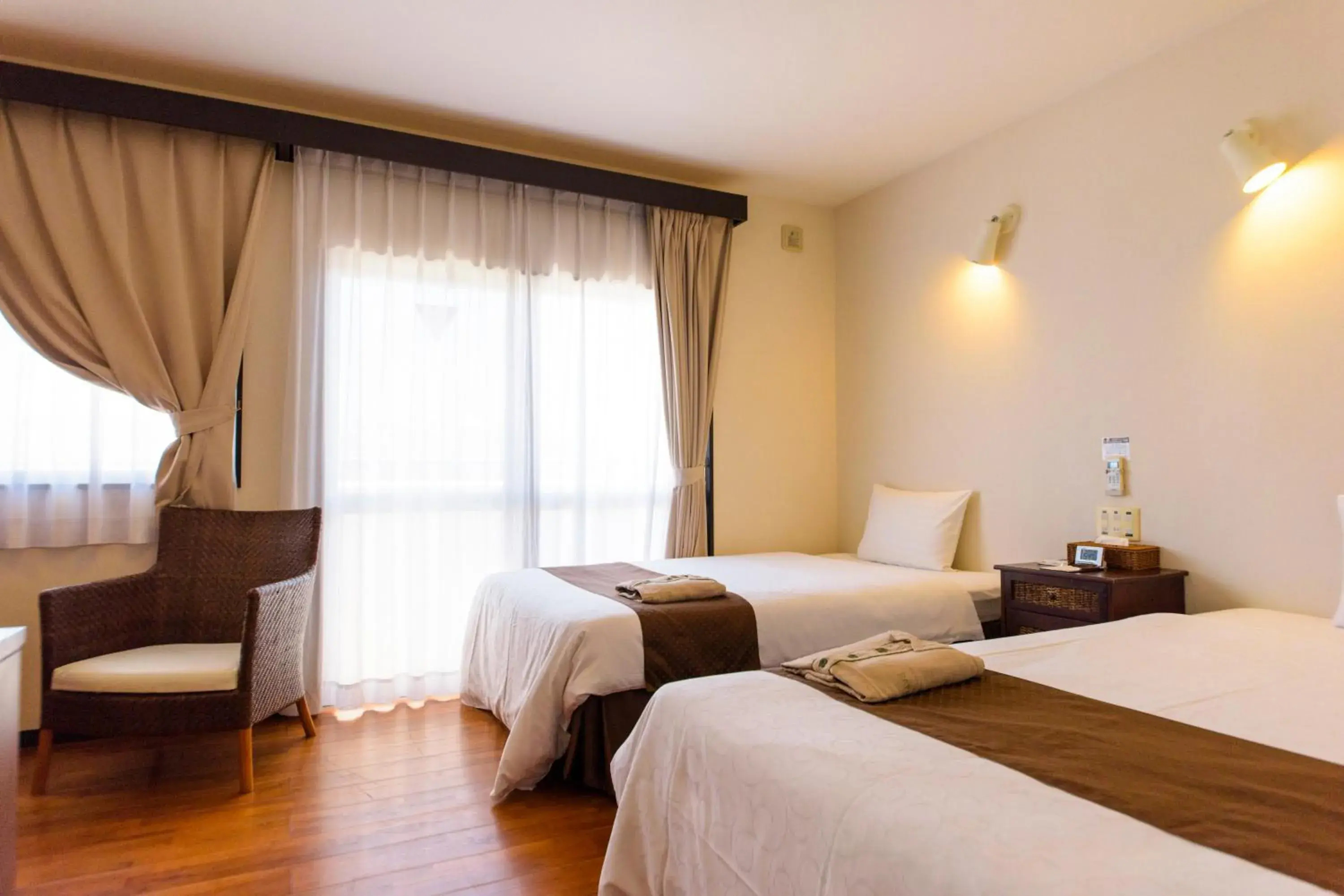 Photo of the whole room, Bed in Hotel Patina Ishigakijima Photo of the whole room, Bed in Hotel Patina Ishigakijima