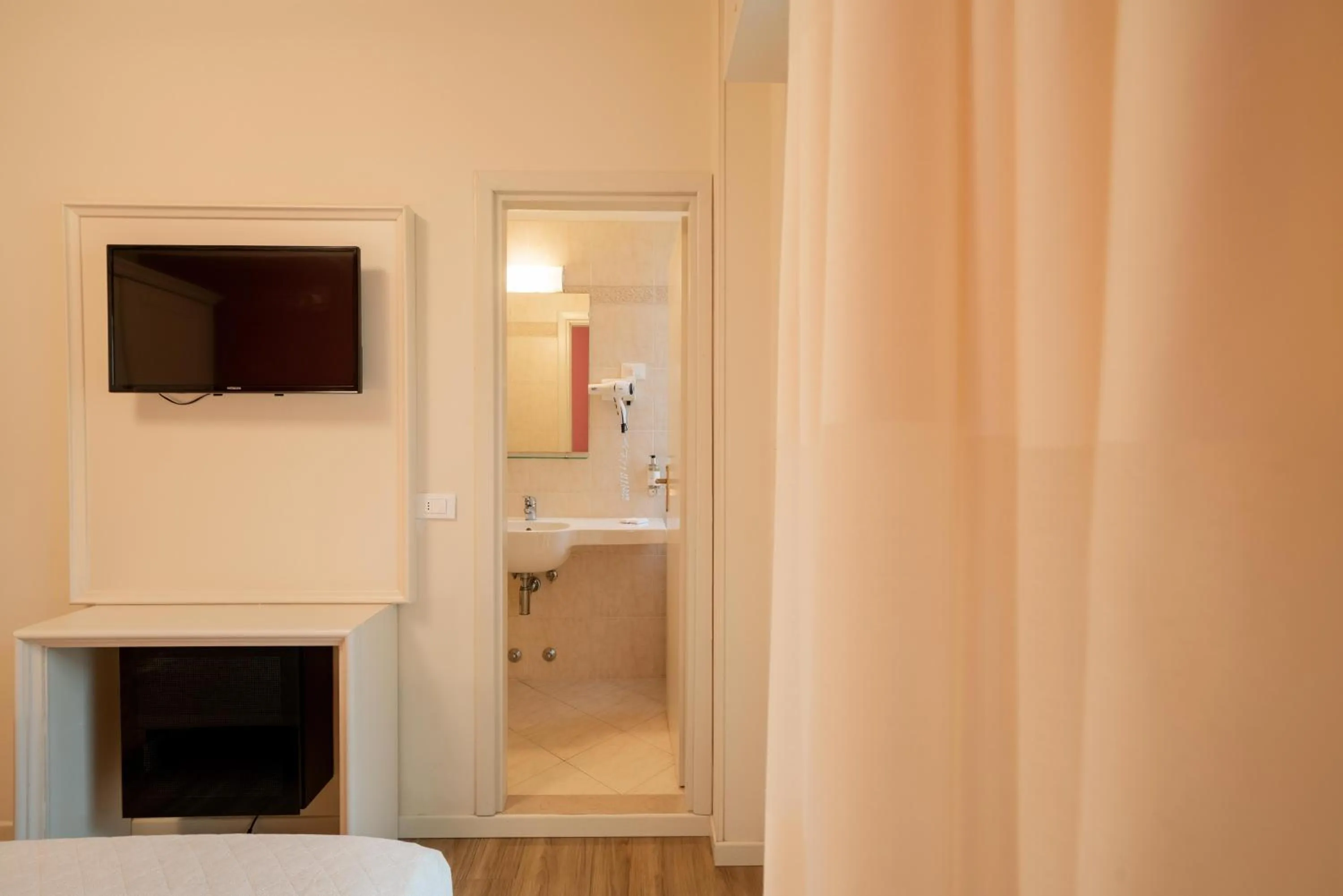 Bedroom in Hotel Orchidea