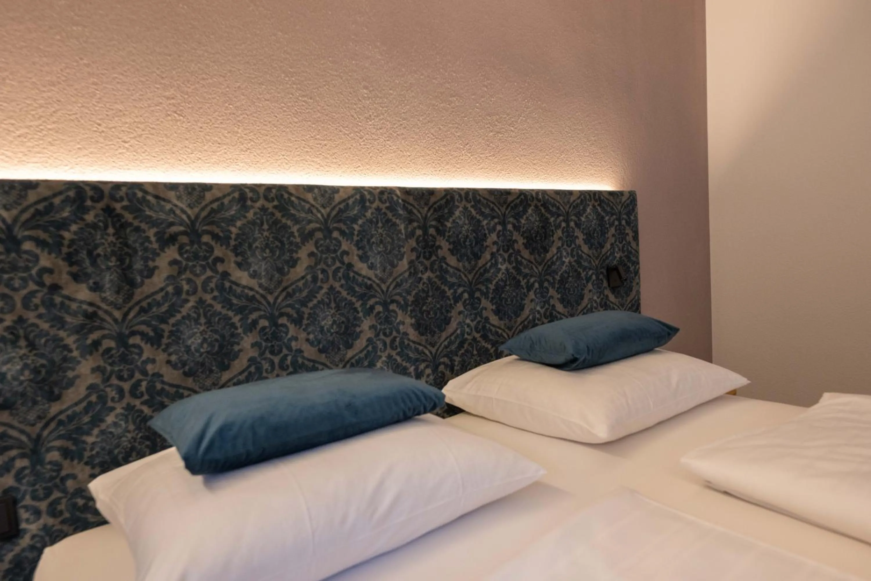 Bed in Hotel Mirabell