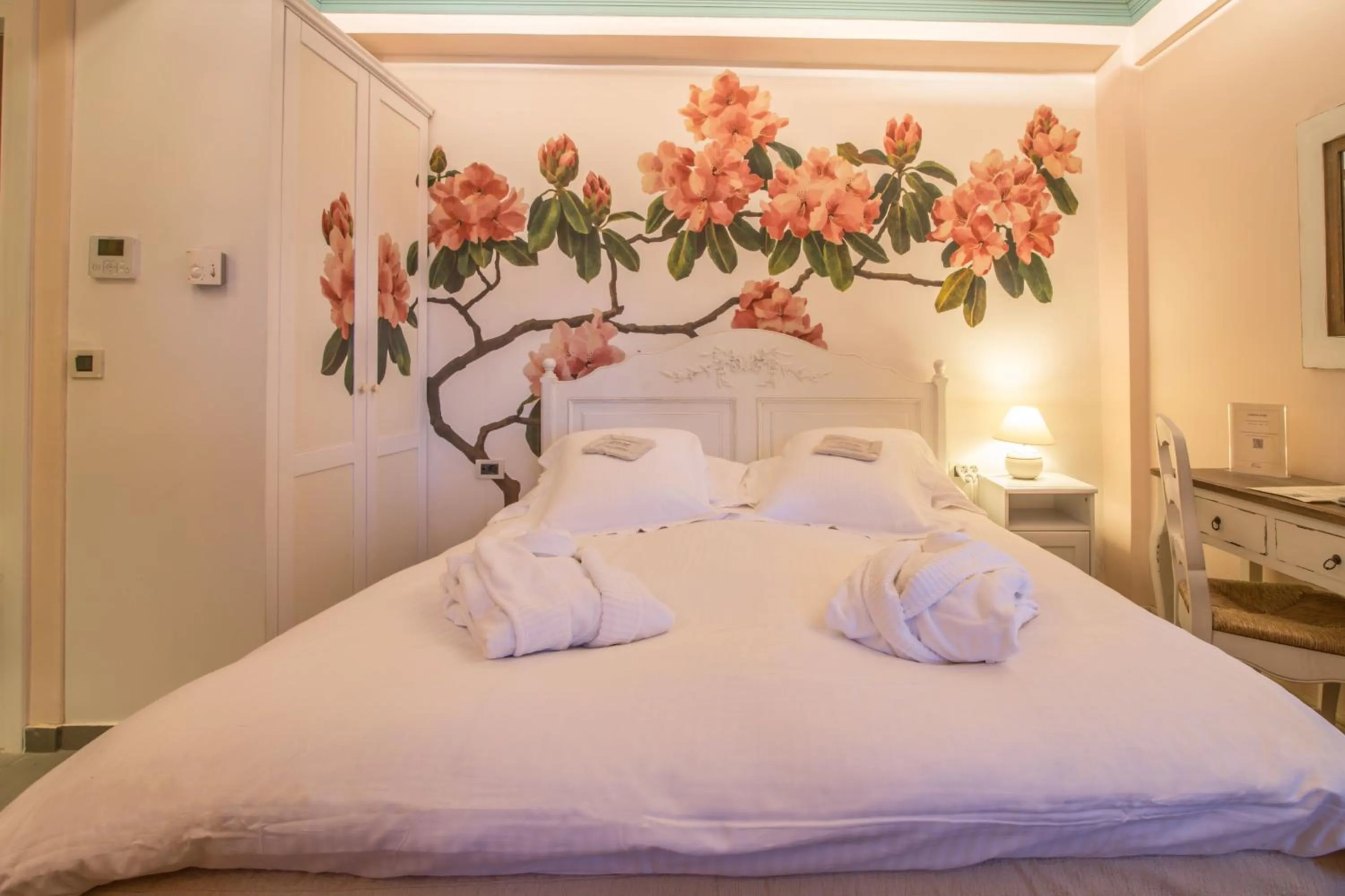 Bed in Pirrion Wellness Boutique Hotel