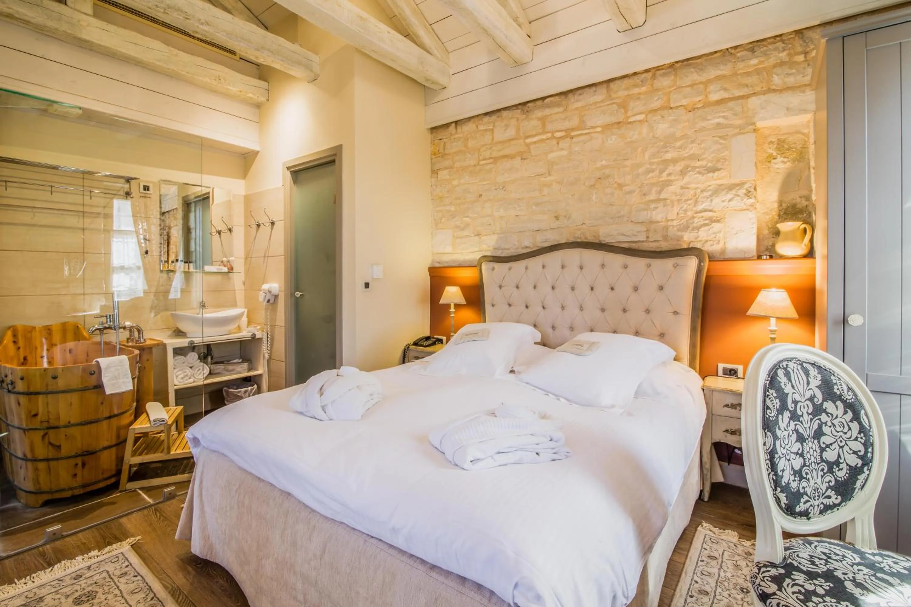 Bed in Pirrion Wellness Boutique Hotel