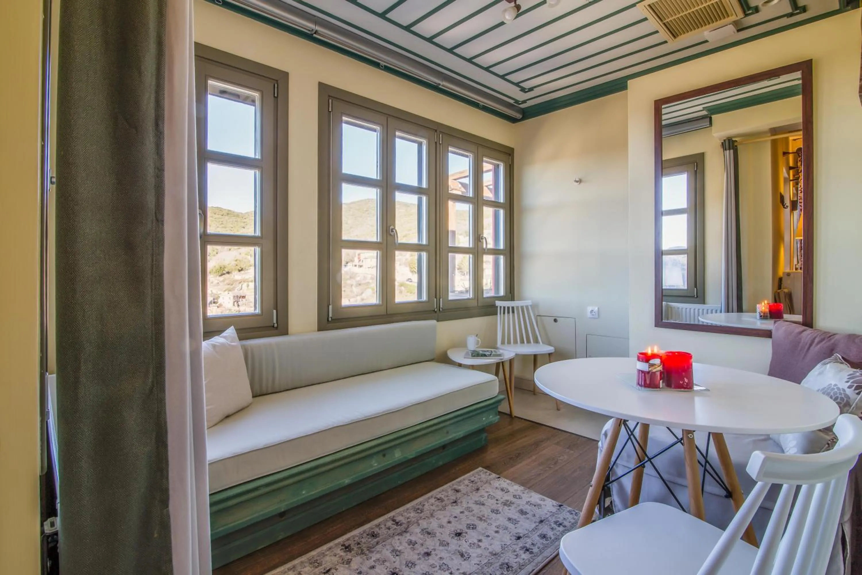 Living room, Bed in Pirrion Wellness Boutique Hotel