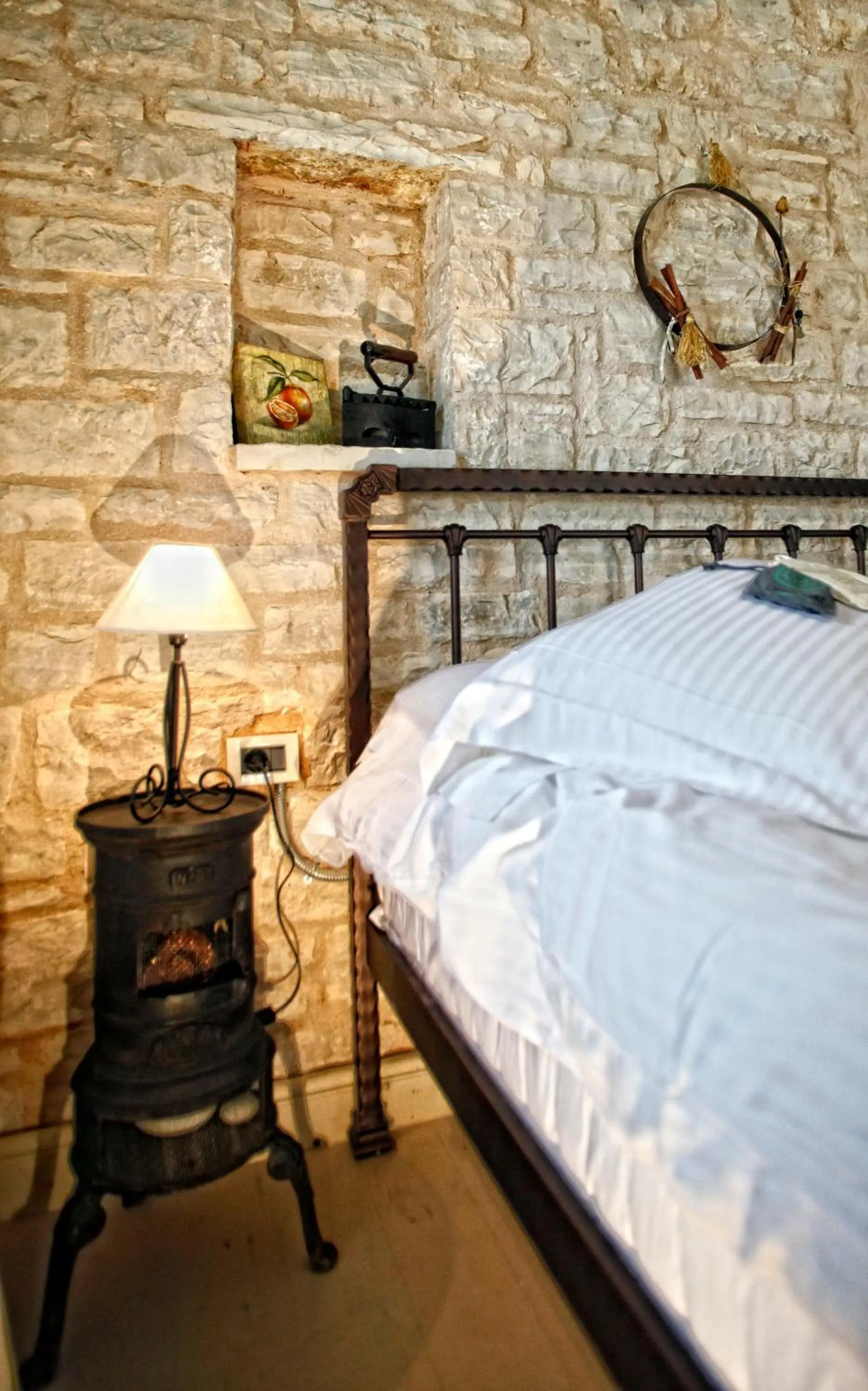 Bed in Pirrion Wellness Boutique Hotel