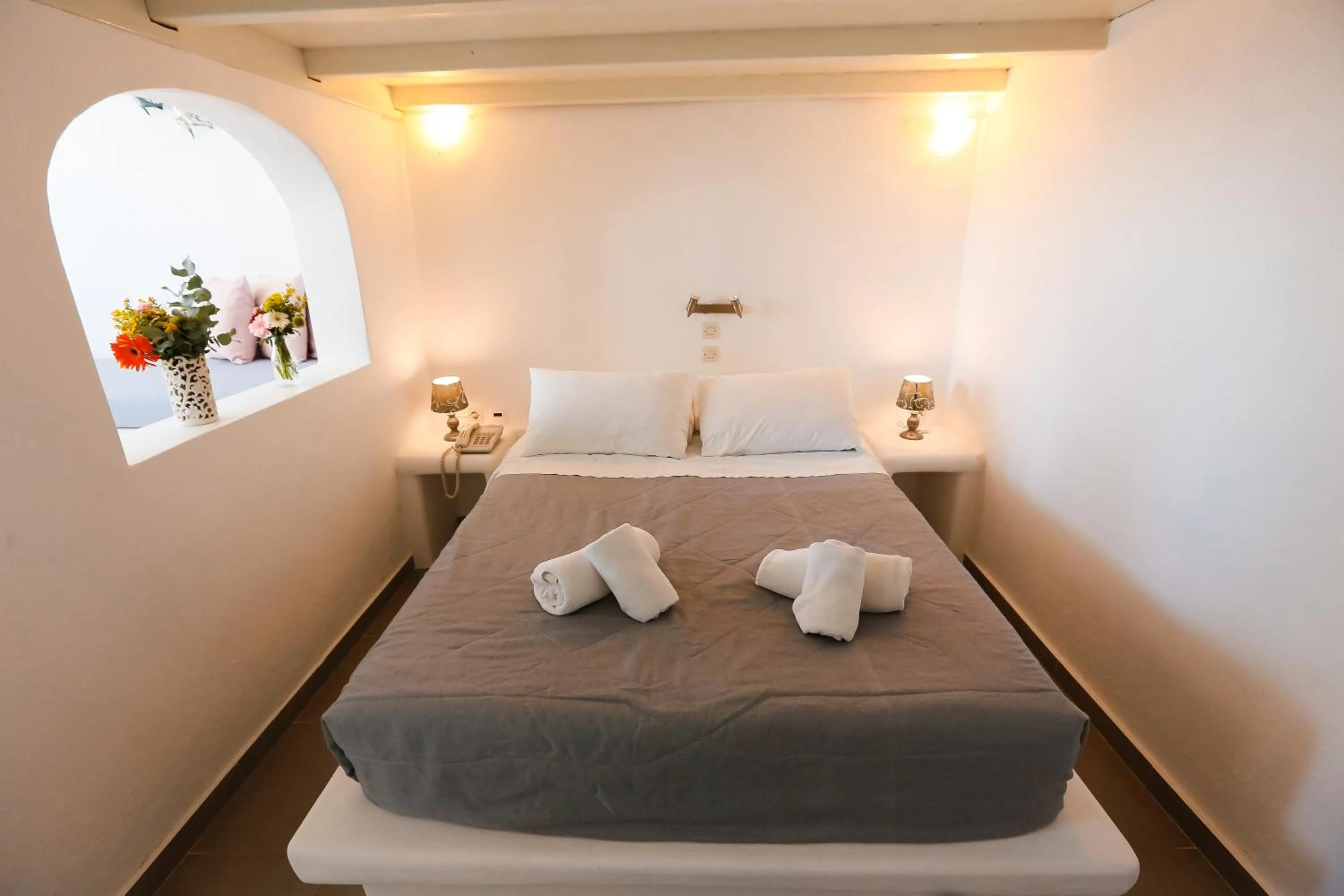 Bed in Ilioperato Hotel