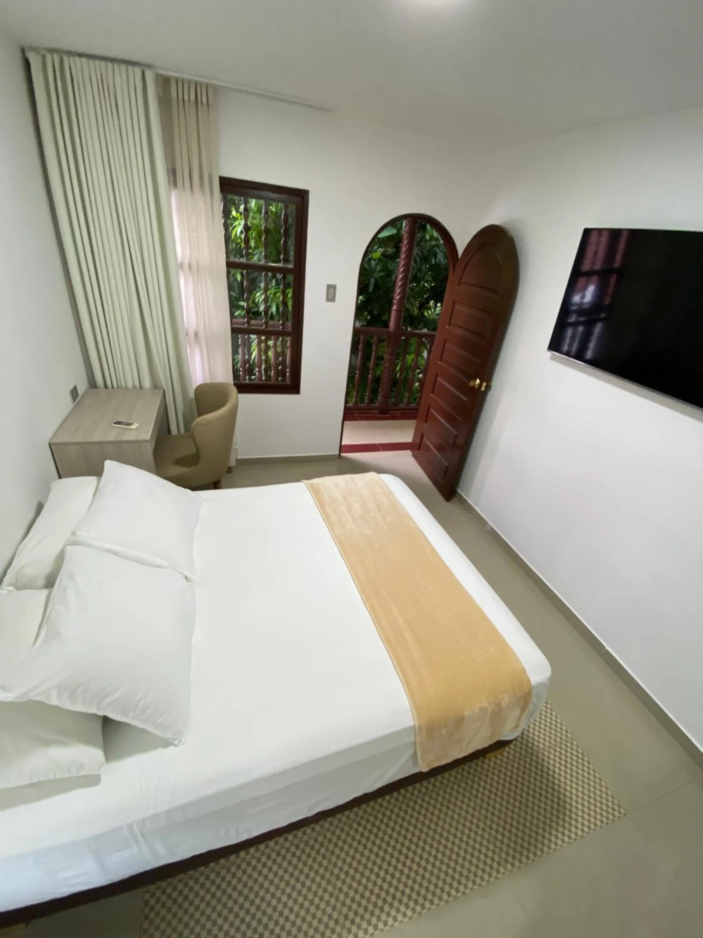 Garden view, Bed in Hotel Casa Colonial