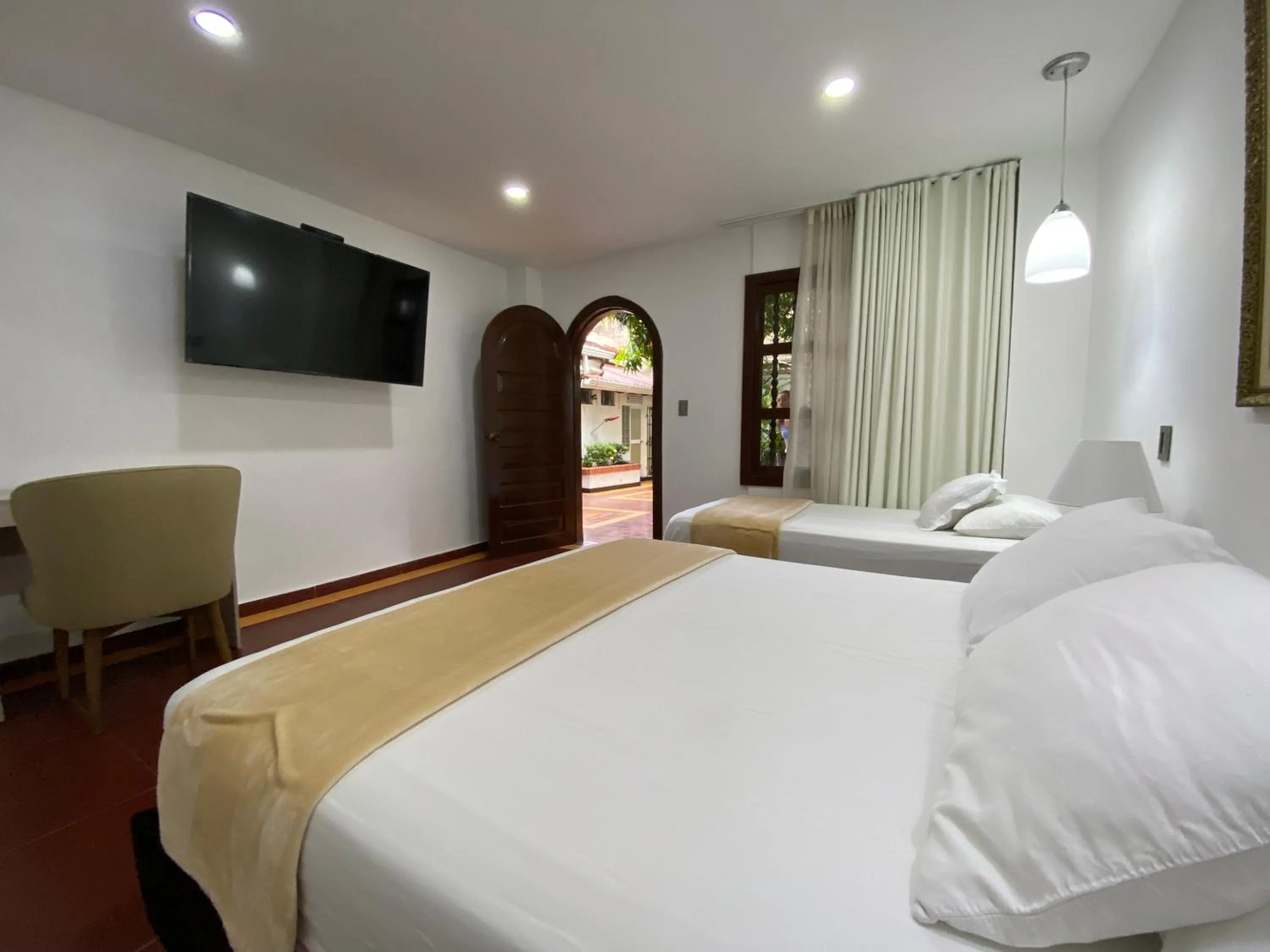 Bed in Hotel Casa Colonial