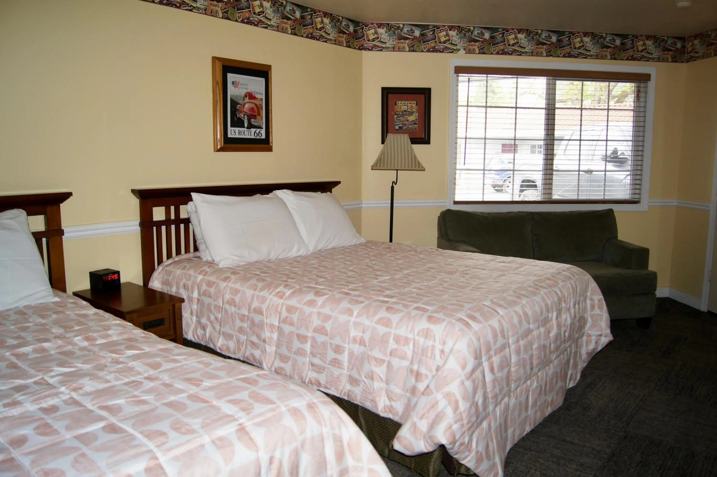 Bed in Flamingo Motel