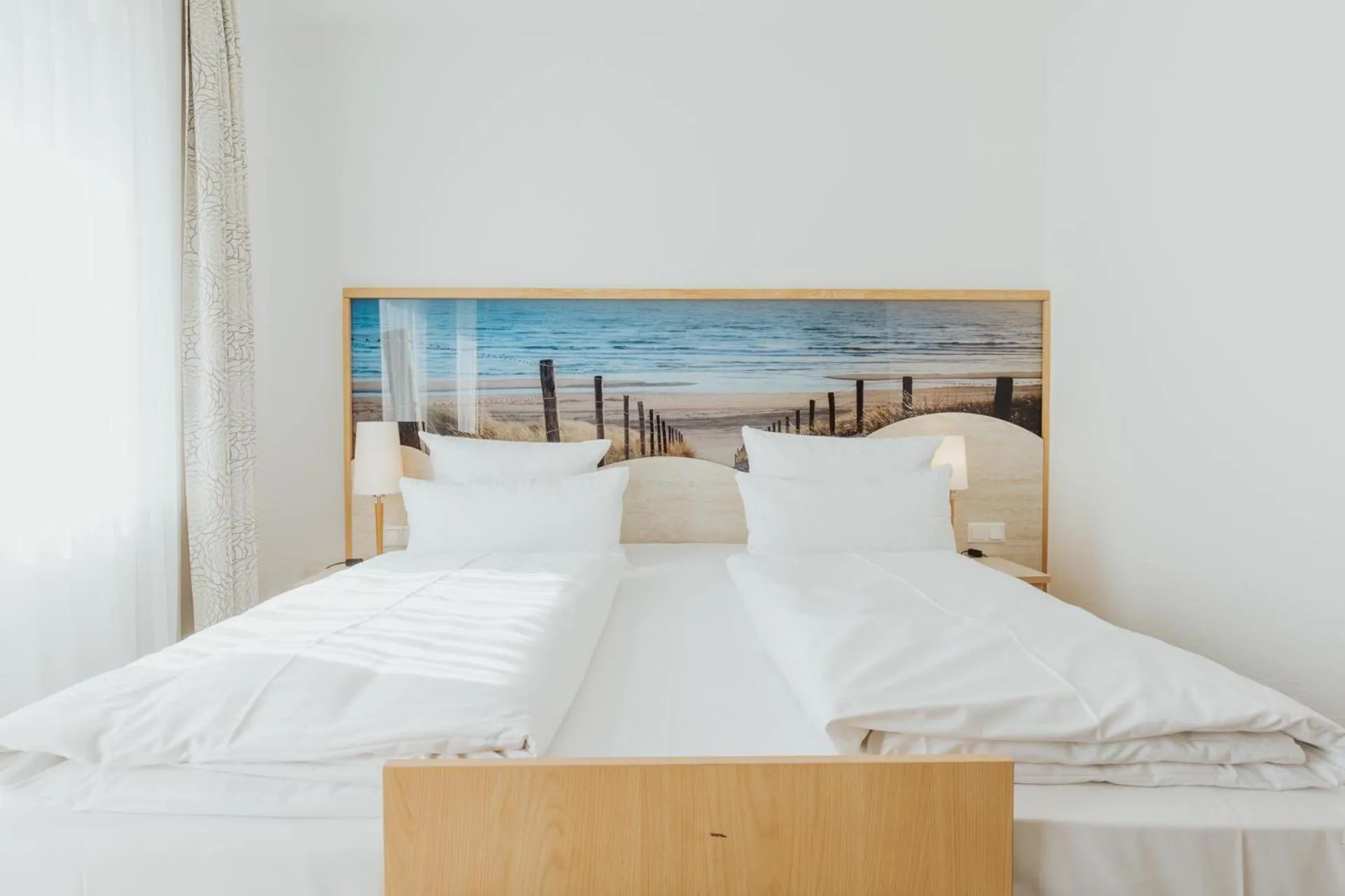 Bed in Parkhotel IV Jahreszeiten Kühlungsborn