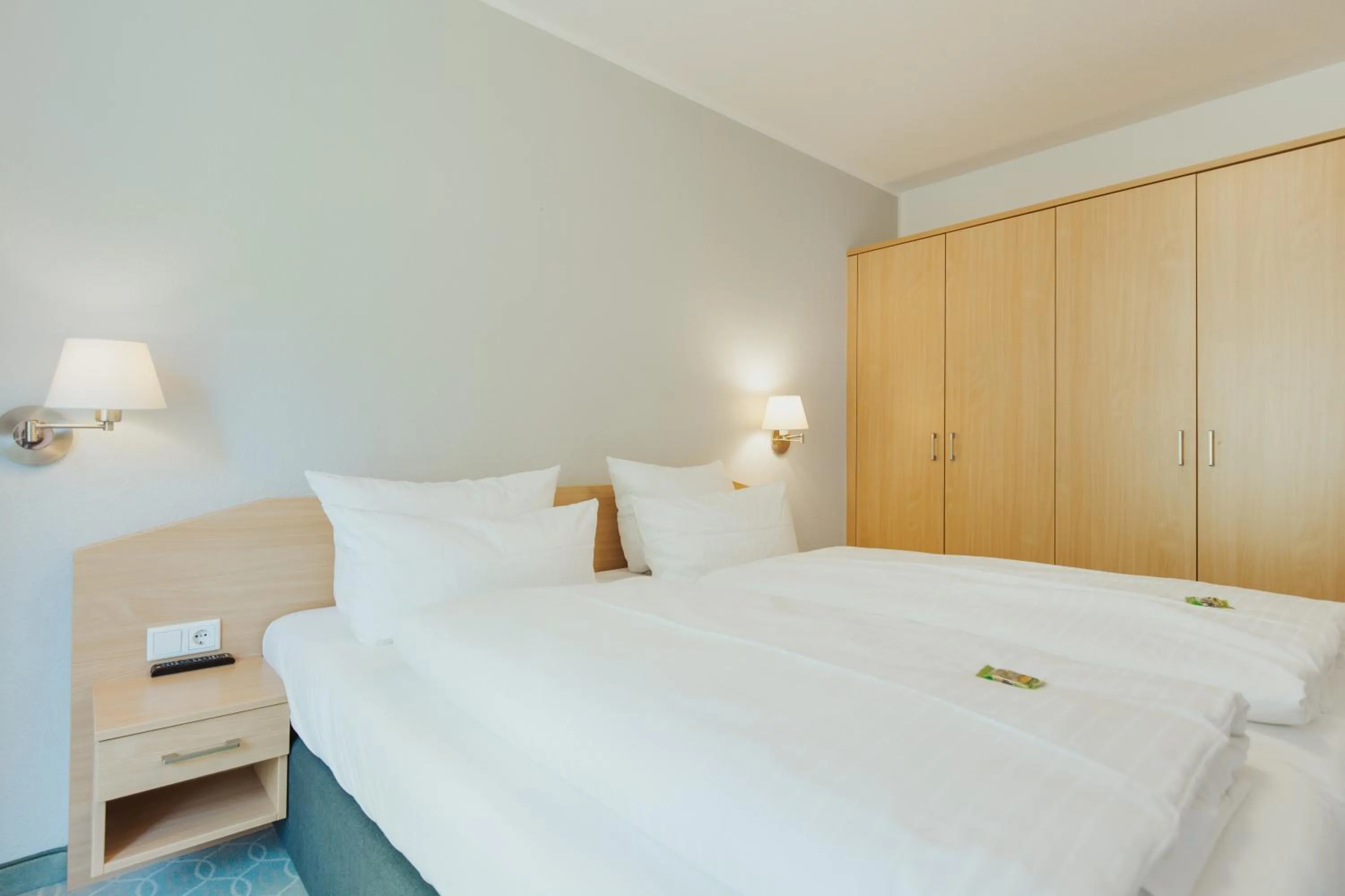 Bed in Parkhotel IV Jahreszeiten Kühlungsborn