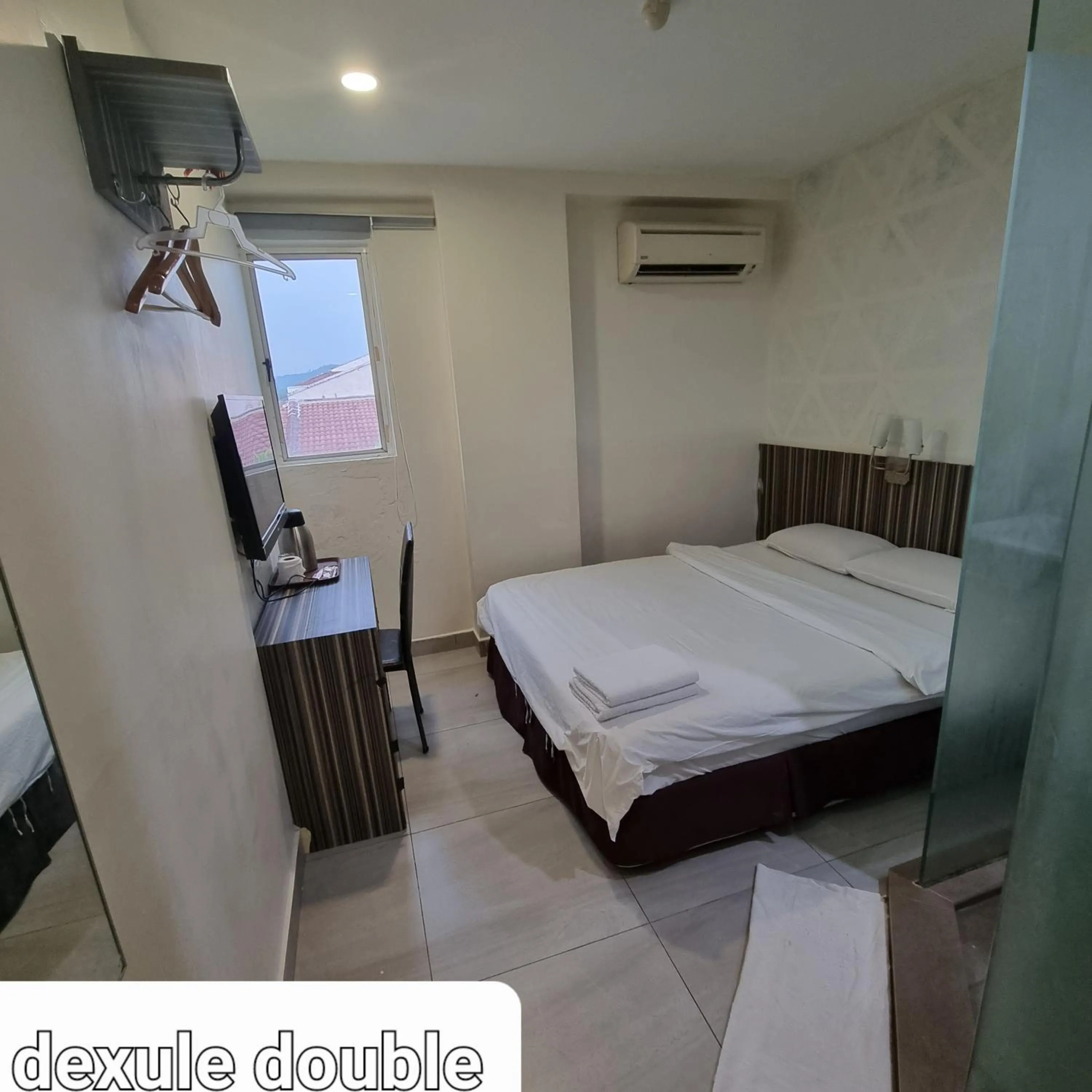 Bed in Sunrise Golden Hotel