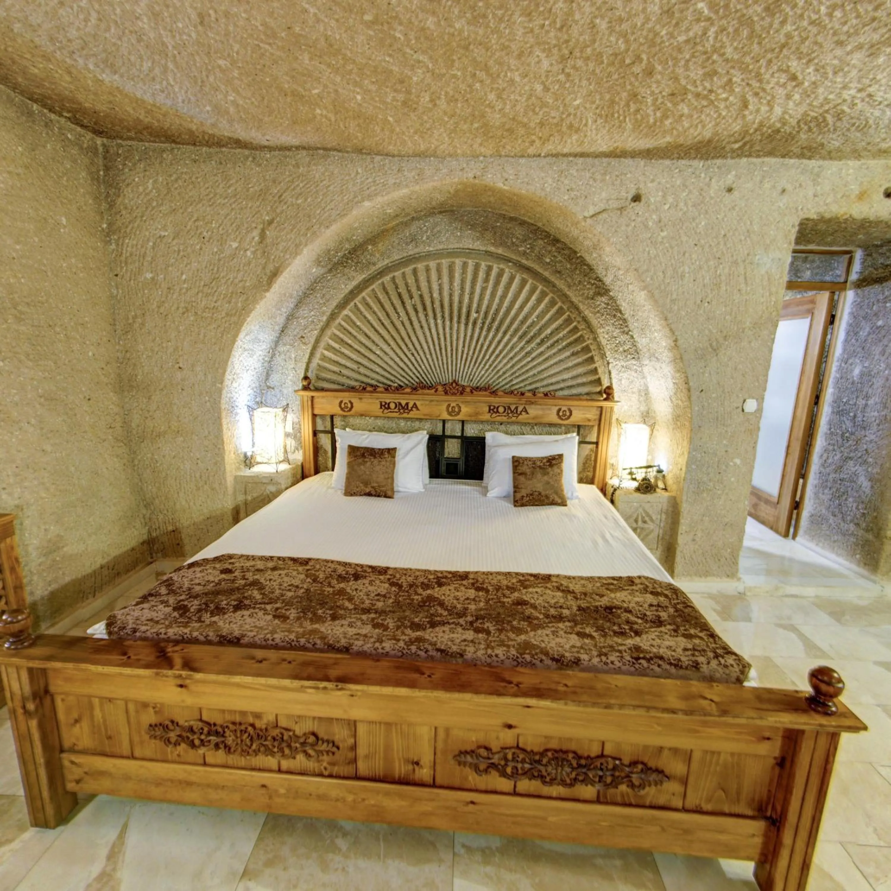 Bed in Roma Cave Suite