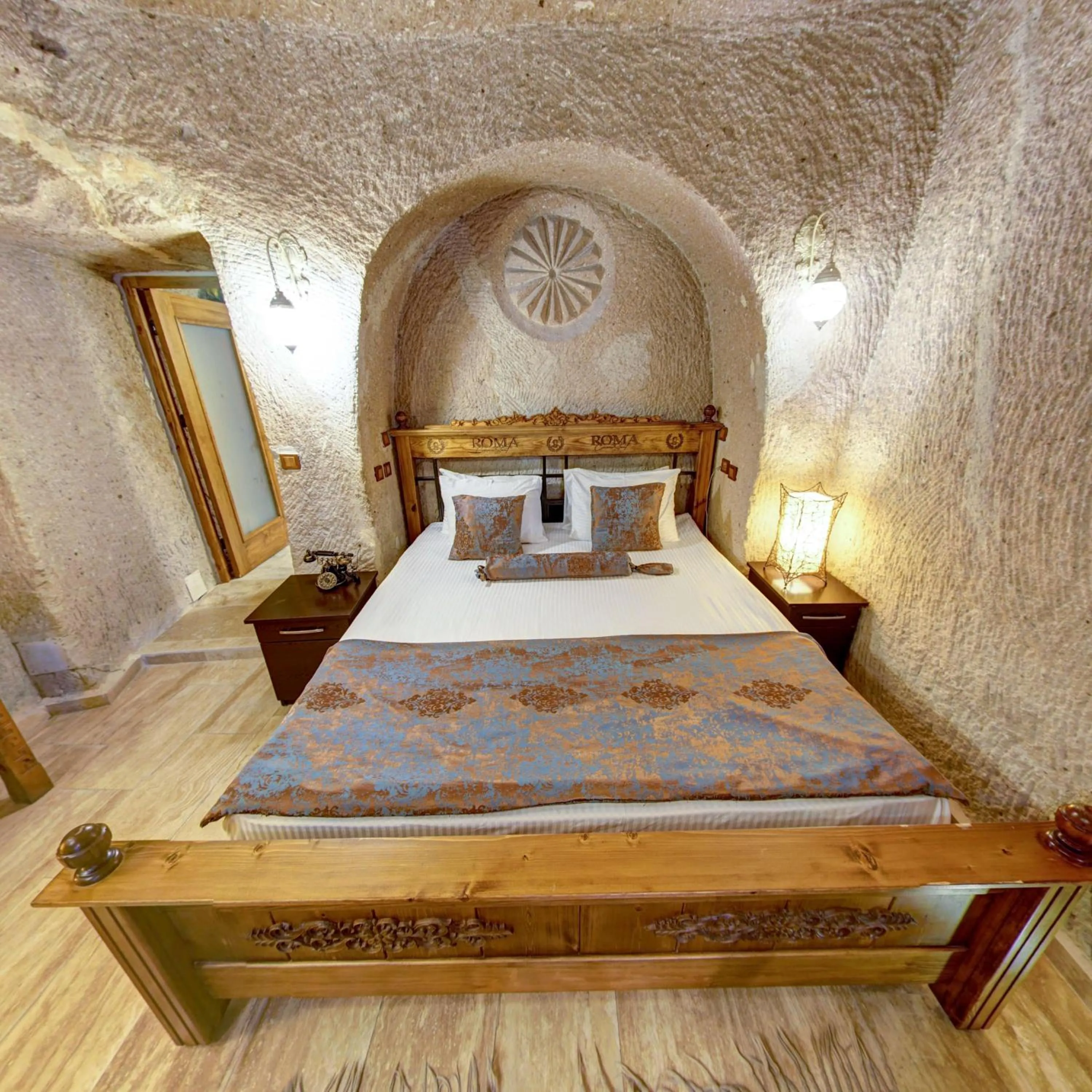 Bed in Roma Cave Suite